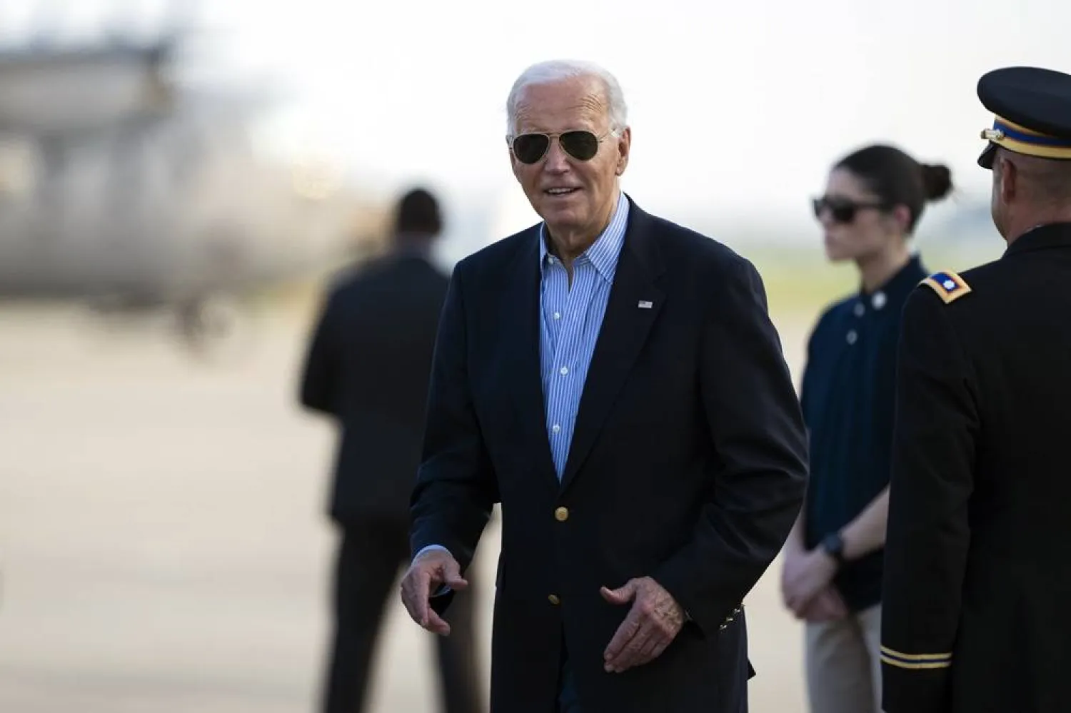  President Joe Biden responds to questions from the traveling press as he arrives at Delaware Air National Guard Base in New Castle, Del., Friday, July 5, 2024, from a campaign rally in Madison, Wis. (AP)