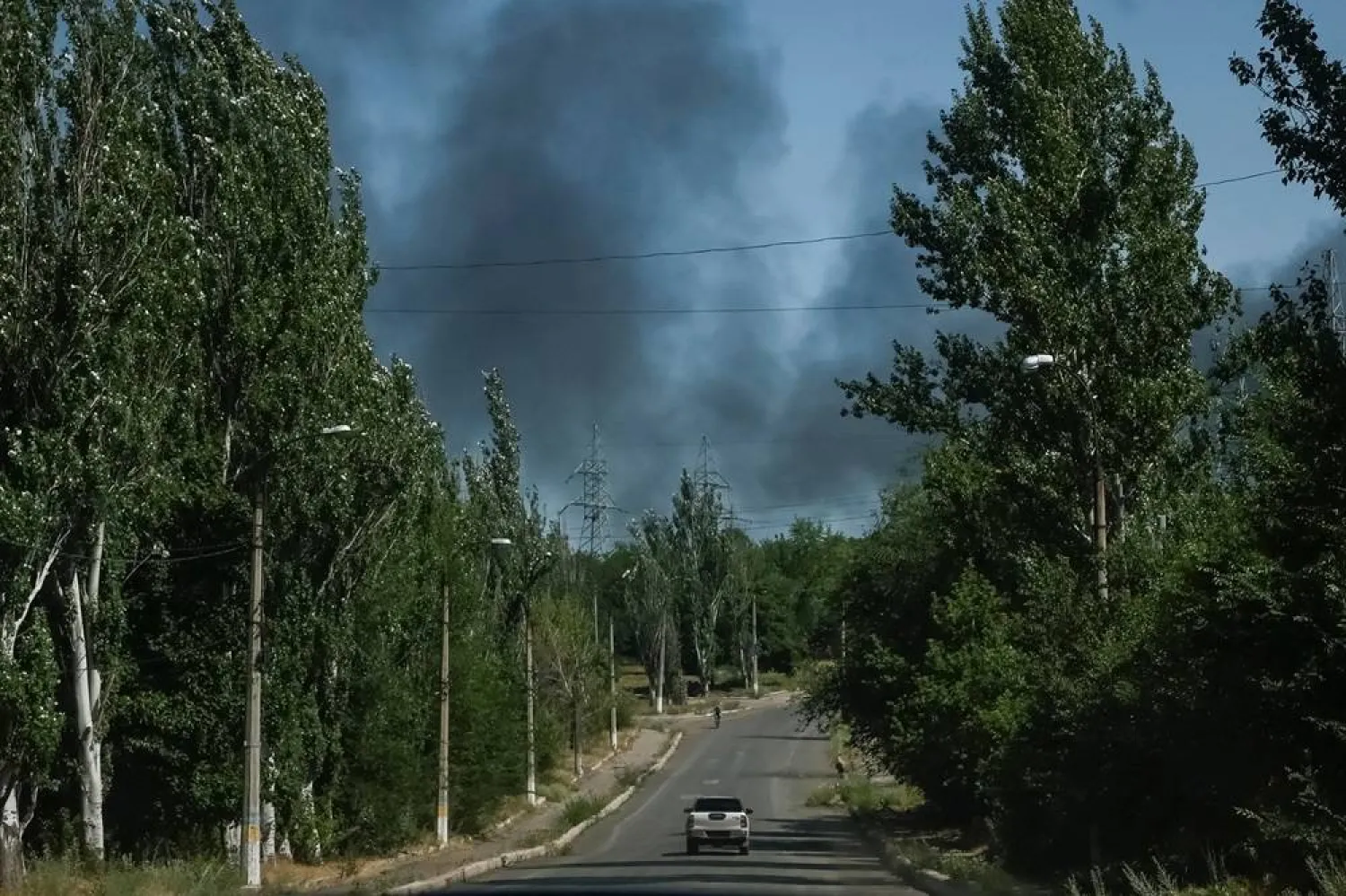  Smoke rises after recent Russian air strikes, in the town of Toretsk, amid Russia's attack on Ukraine, near a front line in Donetsk region, Ukraine July 3, 2024. (Reuters)