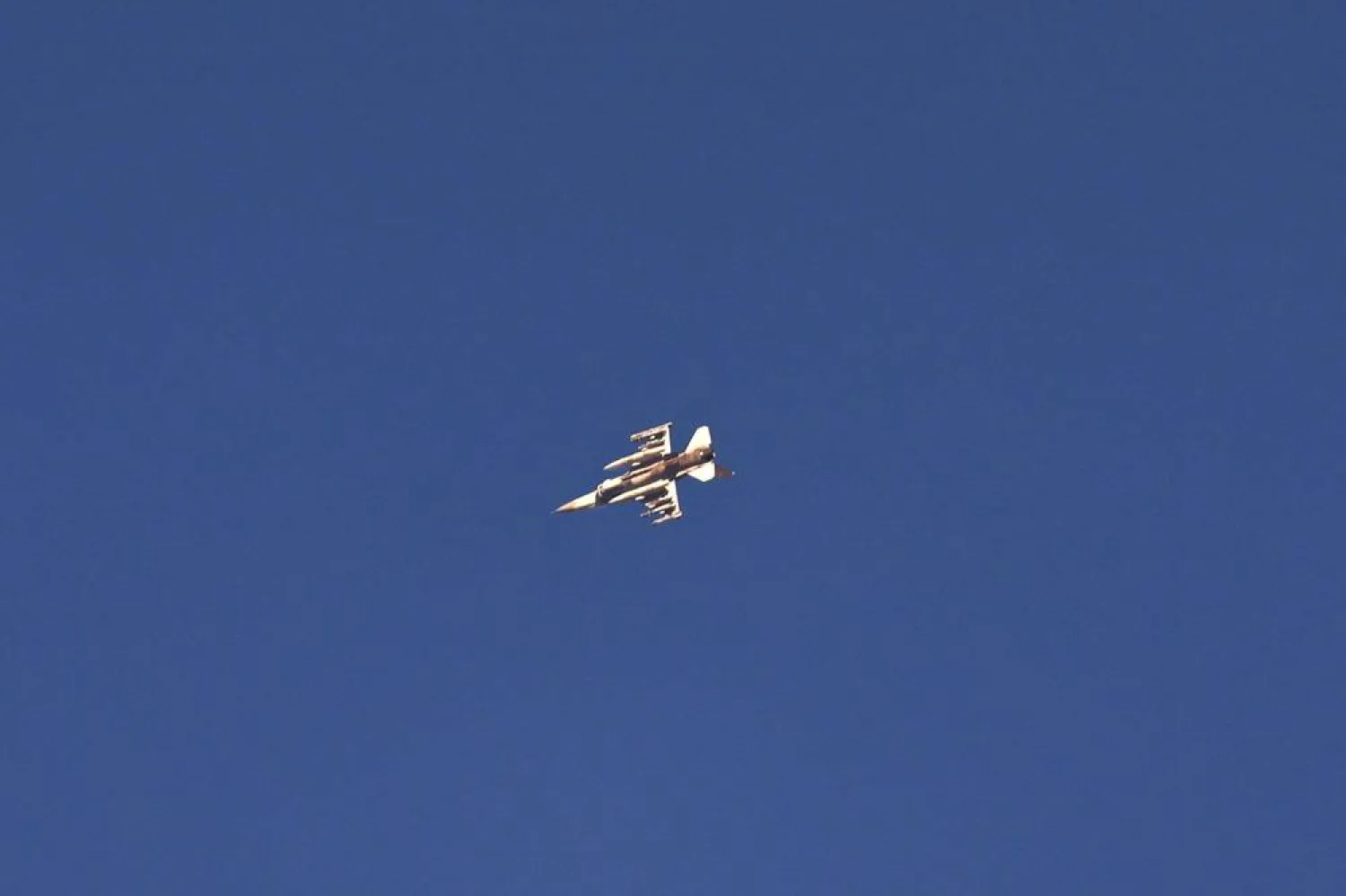 An Israeli fighter jet flies over an area in southern Lebanon, as seen from an undisclosed location in northern Israel, 07 July 2024. (EPA)