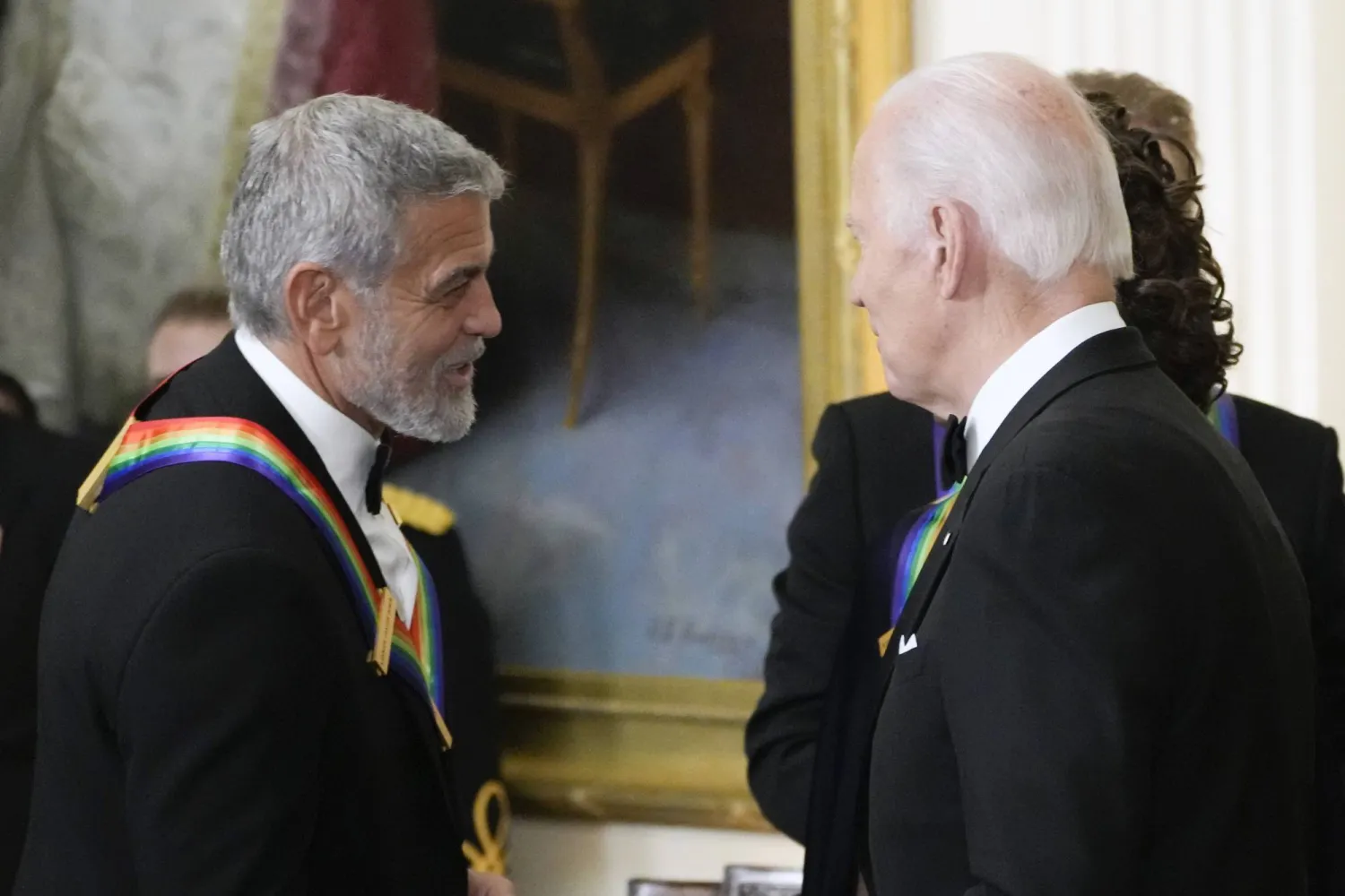 FILE - President Joe Biden shakes hands with actor, director and producer George Clooney during the Kennedy Center honorees reception at the White House in Washington, Dec. 4, 2022. (AP Photo/Manuel Balce Ceneta)