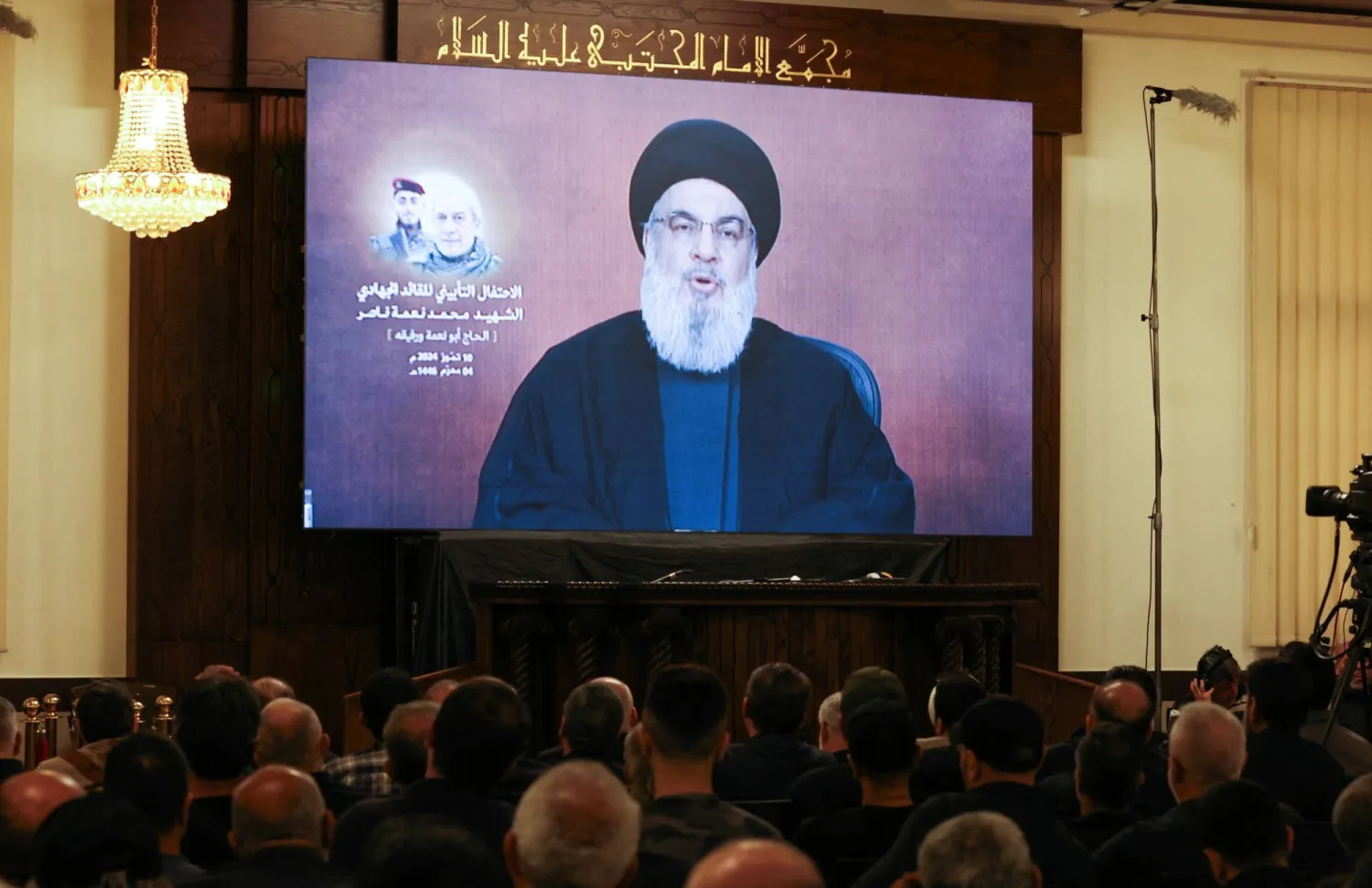 Lebanon's Hezbollah leader Hassan Nasrallah speaks during a televised address at a memorial service for Mohammed Nasser, Hezbollah's senior commander who was killed on June 3 in an Israeli strike in south Lebanon, in Beirut's southern suburbs, Lebanon, July 10, 2024. REUTERS/Mohamed Azakir