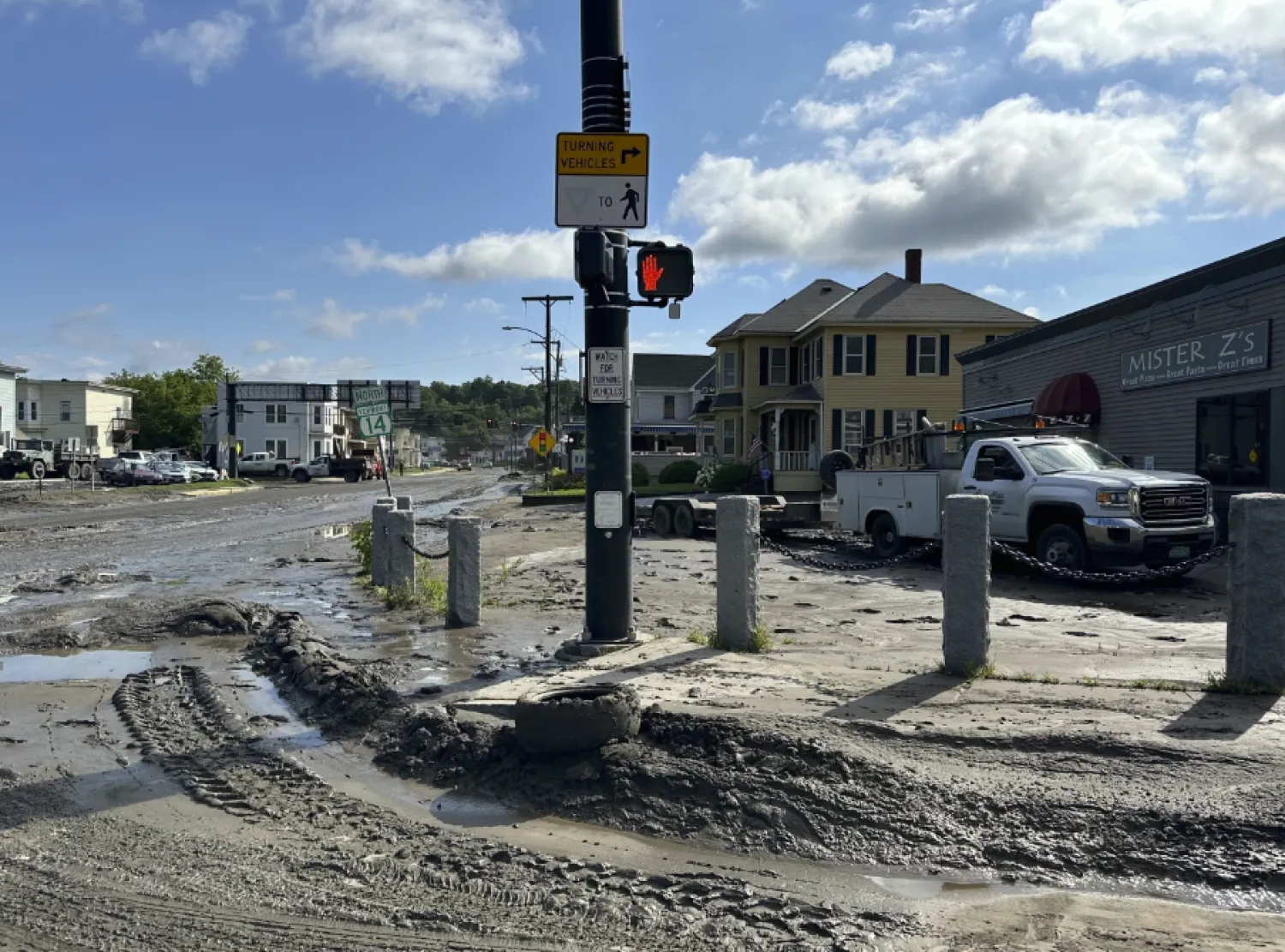 In Plainfield, residents of a six-unit apartment building had only 15 minutes to evacuate before the entire structure was swept away by floodwaters - The AP
