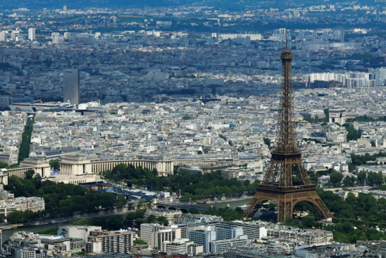 An aerial view shows the Eiffel Tower, the Seine River, the Trocadero Champions Park, and the city rooftops of residential apartment buildings ahead of the Paris 2024 Olympics and Paralympics Games in Paris, France, July 10, 2024. REUTERS/Gonzalo Fuentes/File Photo Purchase Licensing Rights