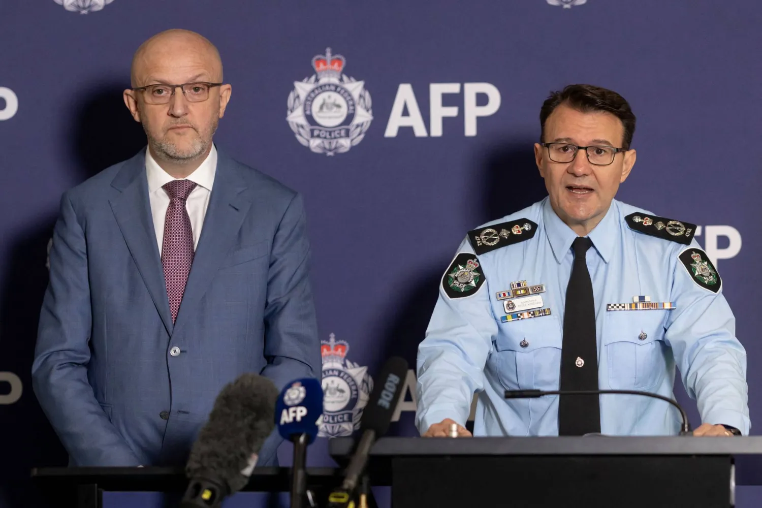 A supplied image shows ASIO Director-General Mike Burgess and AFP Commissioner Reece Kershaw addressing the media in Canberra, Australia July 12, 2024. AAP Image/Supplied by Australian Federal Police via REUTERS