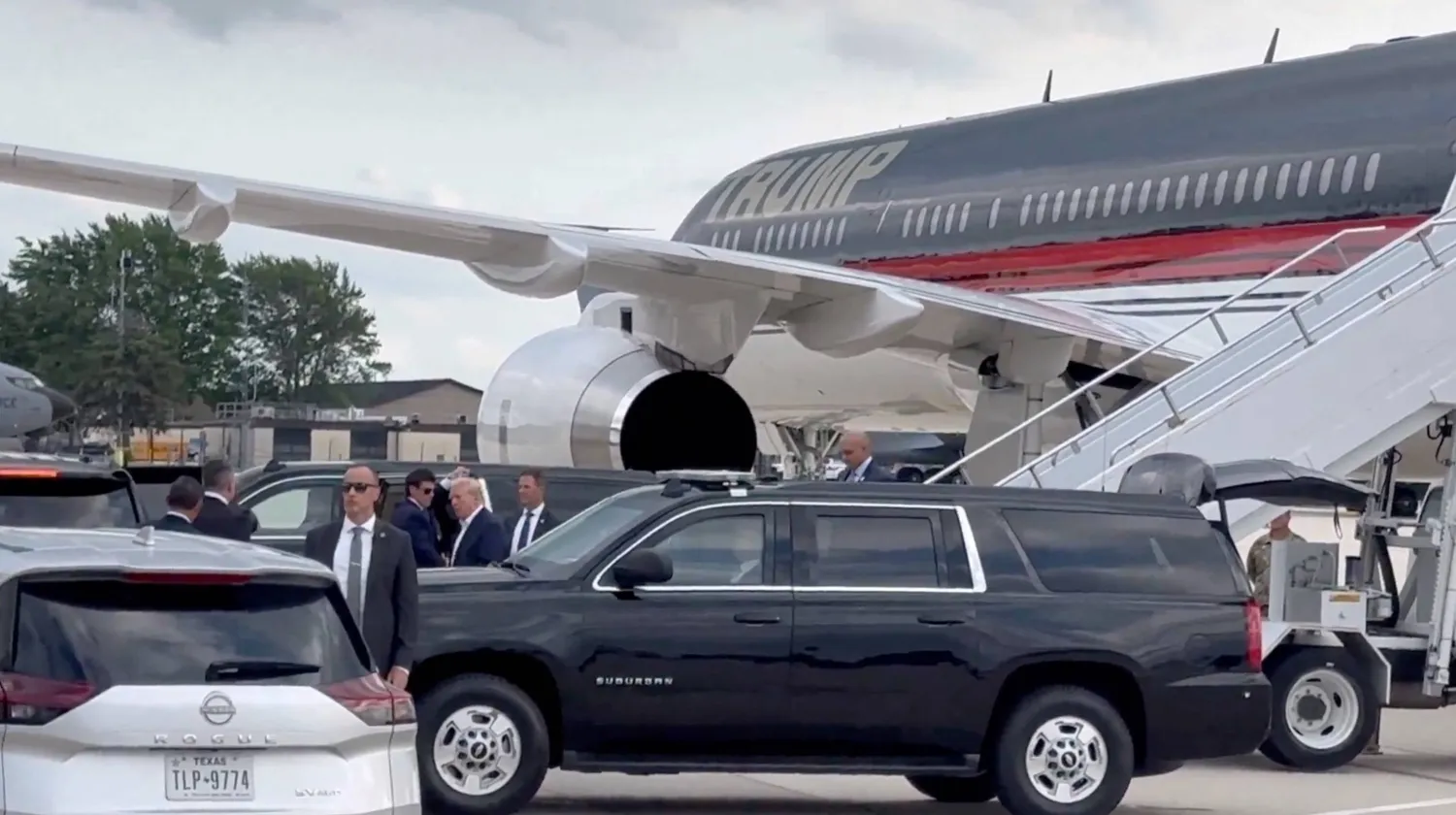 Republican presidential candidate and former US President Donald Trump arrives at Milwaukee Mitchell International Airport a day after he survived an assassination attempt at a rally in Butler, Pennsylvania, in Milwaukee, Wisconsin, US, July 14, 2024 in this screengrab obtained from a social media video. Dan Scavino Jr. via X/via REUTERS 
