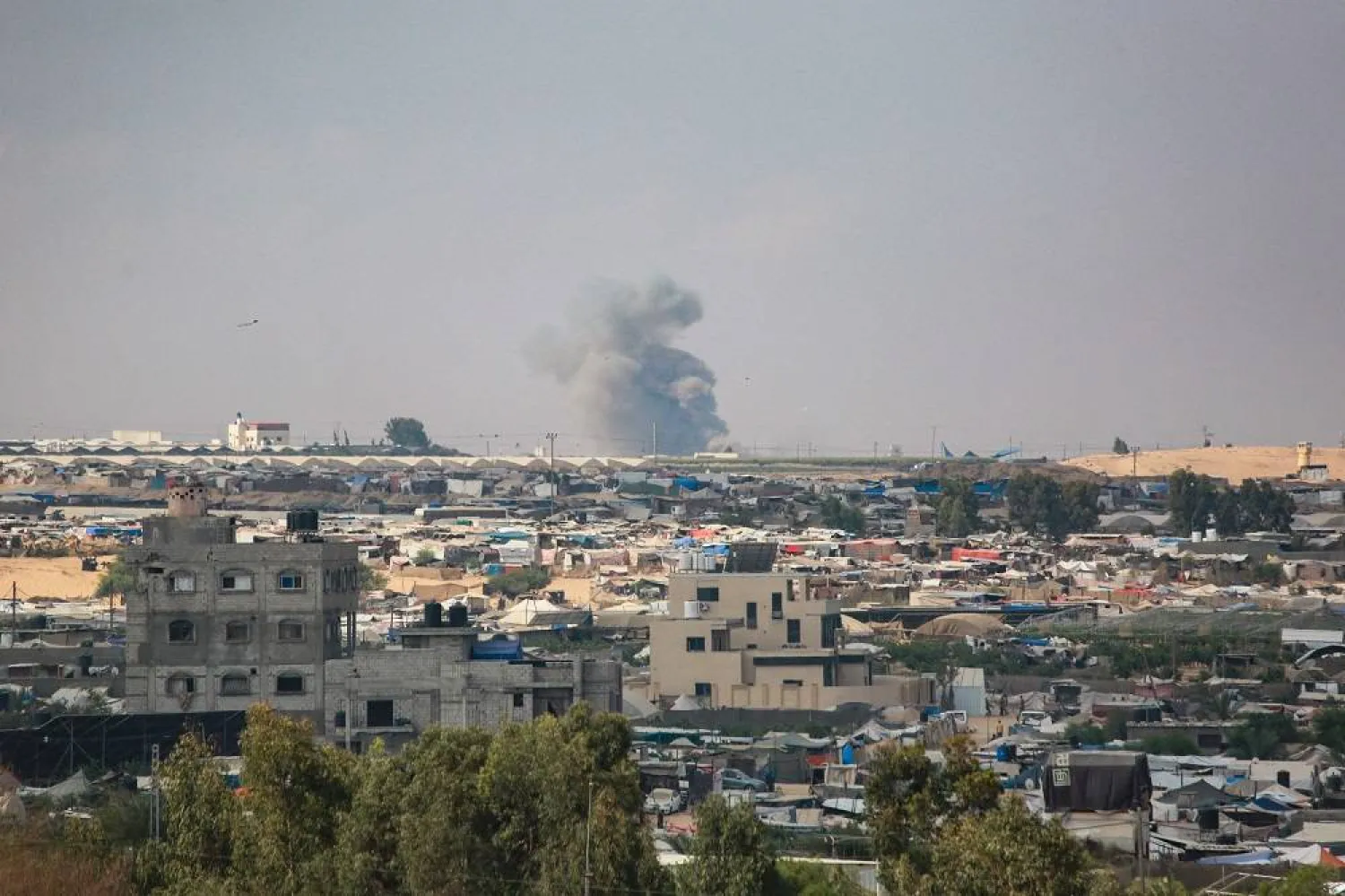 This picture taken in Khan Younis shows smoke billowing during Israeli military operations in Rafah, in the southern Gaza Strip, on July 24, 2024, amid the ongoing conflict between Israel and the Palestinian group Hamas. (AFP) 