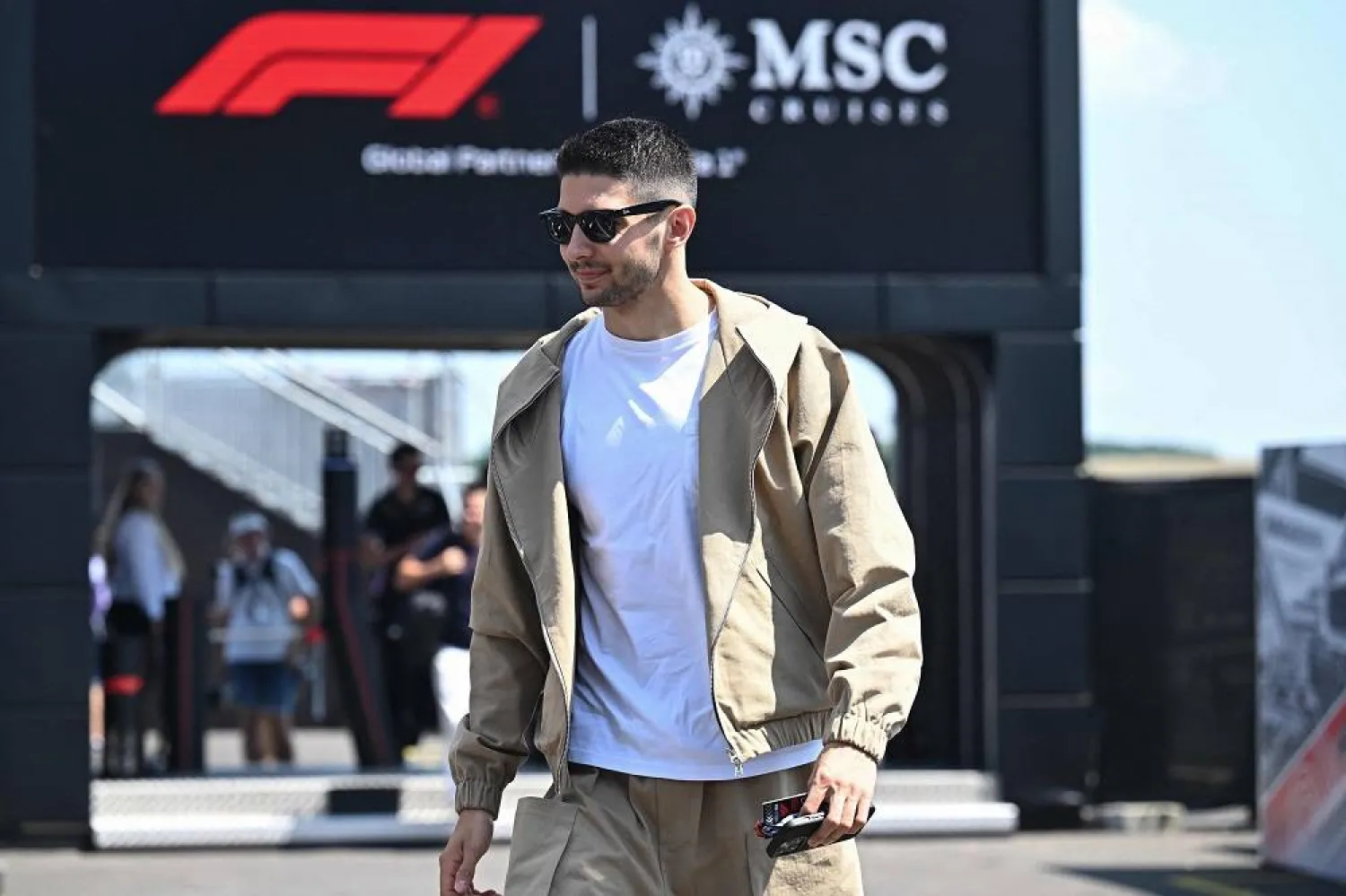 Alpine's French driver Esteban Ocon arrives at the Hungaroring race track in Mogyorod near Budapest on July 18, 2024, ahead of the Formula One Hungarian Grand Prix. (AFP)