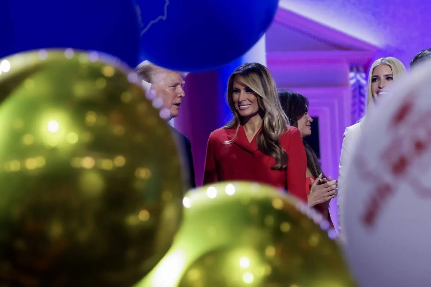 Republican presidential nominee Donald J. Trump (L) stands with his wife Melania (R) after speaking on the final day of the Republican National Convention (RNC) at Fiserv Forum in Milwaukee, Wisconsin, USA, 18 July 2024. (EPA)
