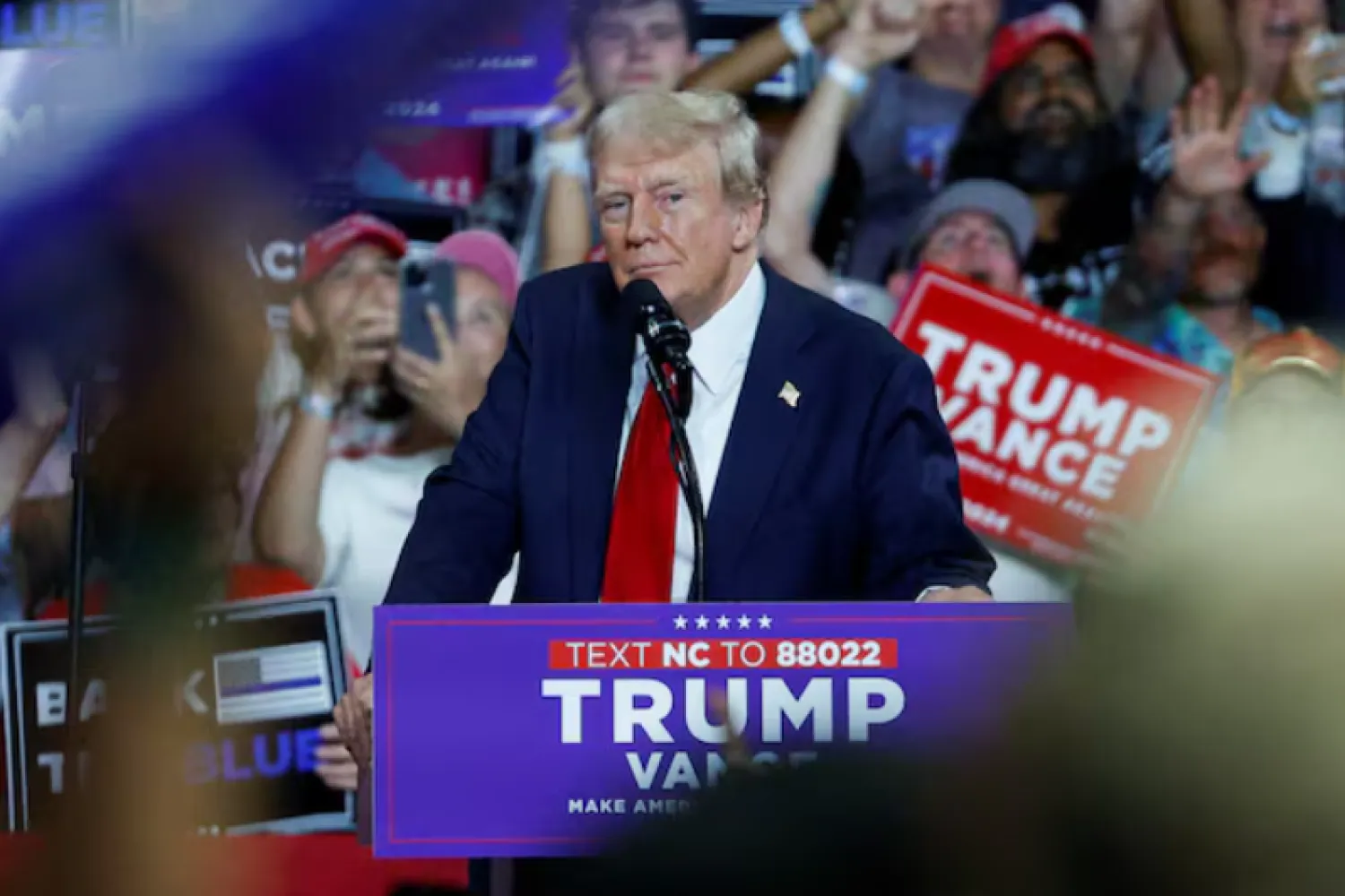 Republican presidential nominee and former US President Donald Trump looks on as he campaigns in Charlotte, North Carolina, US July 24, 2024. REUTERS/Marco Bello/File Photo Purchase Licensing Rights
