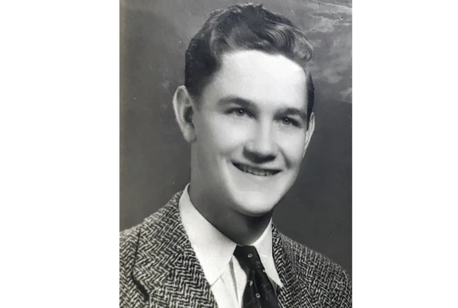 This 1944 photo provided by Honoring Our Fallen shows WWII veteran US Army Air Force Tech. Sgt. Donald V. Banta from Los Angeles. Banta, 21, was killed in action in early 1944 when his plane was hit by anti-aircraft fire over Gotha, Germany. On Thursday, July 25, 2024 community members lined the roads to honor Banta as he was brought from Ontario International Airport in southern California to a burial home. (Honoring Our Fallen via AP)

