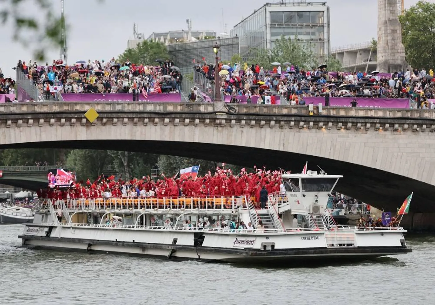  Members of delegations are seen during the opening ceremony of the Paris 2024 Olympic Games in Paris on July 26, 2024. (AFP) 