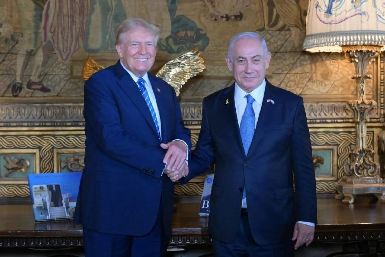 26 July 2024, US, Palm Beach: Israeli Prime Minister Benjamin Netanyahu (R) welcomed by Former US President Donald Trump ahead of their meeting in Mar-a-Lago. (Amos Ben-Gershom/GPO/dpa)