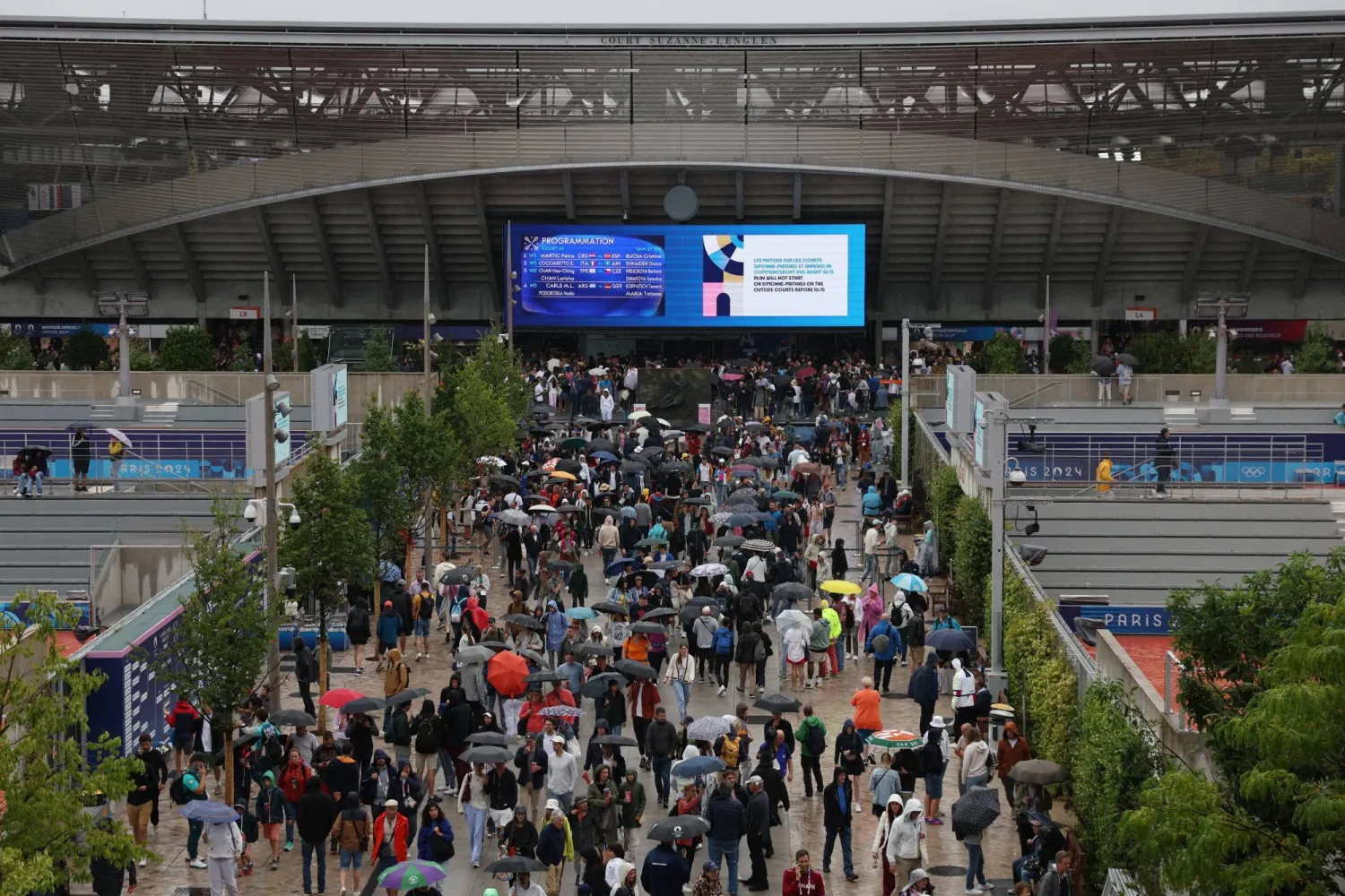 منافسات التنس بالأولمبياد تأثرت بسبب الأمطار (رويترز)