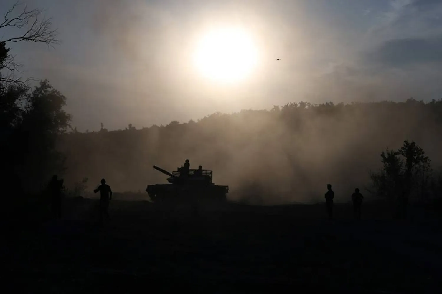  Ukrainian tanks of the 28th Separate Mechanized Brigade take part in the training of fighters of the Shkval special battalion, created from ex-convicts, in an unspecified place in the Donetsk region on July 26, 2024, amid the Russian invasion of Ukraine. (AFP) 