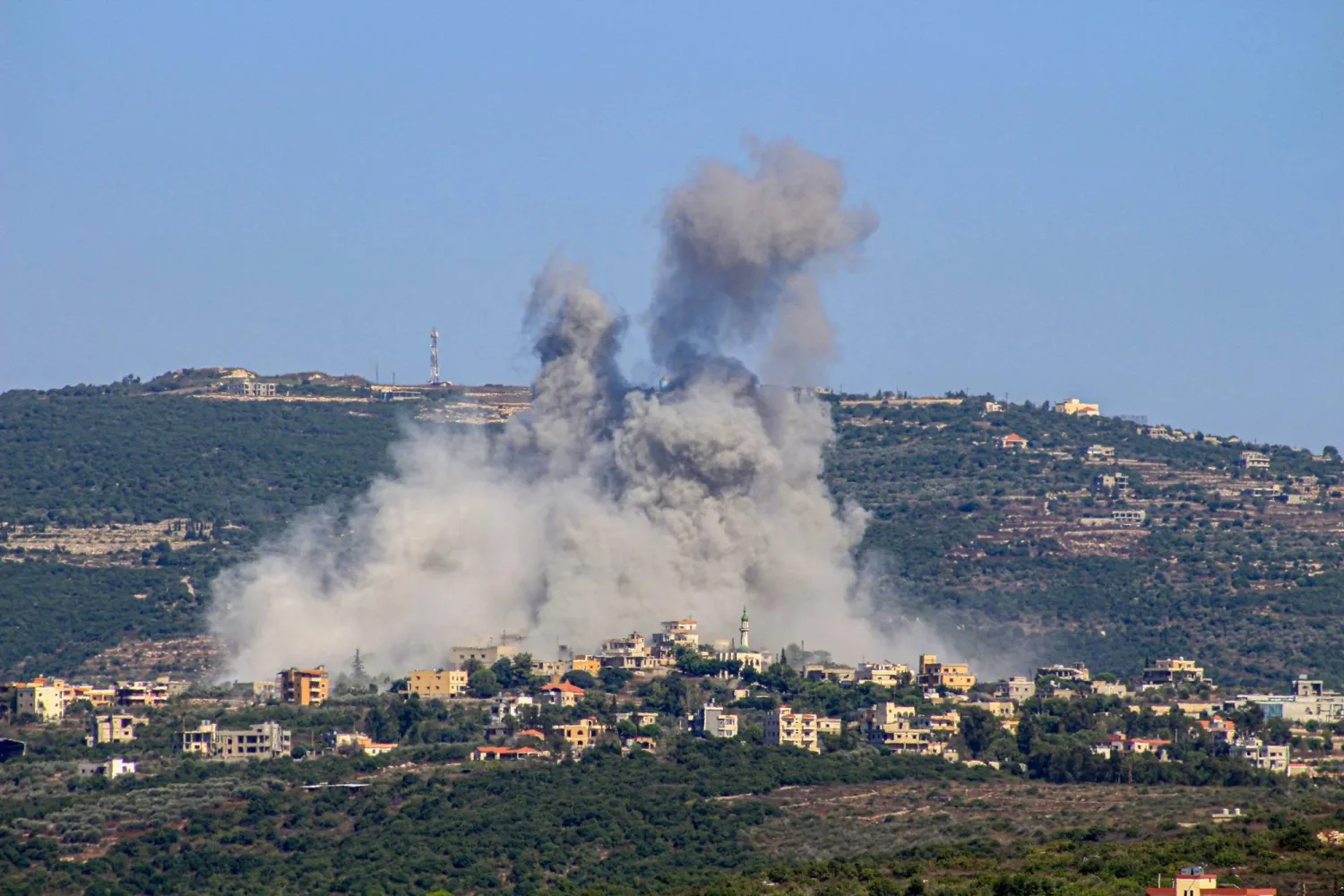 Smoke billows following an Israeli airstrike in the southern Lebanese border village of Chihine on July 28, 2024. (Photo by KAWNAT HAJU / AFP)
