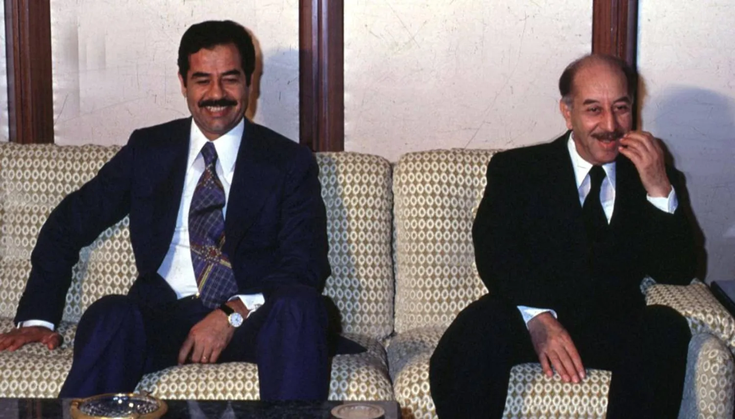 Former Iraqi President Ahmed Hassan al-Bakr and his deputy Saddam Hussein. (AFP)  