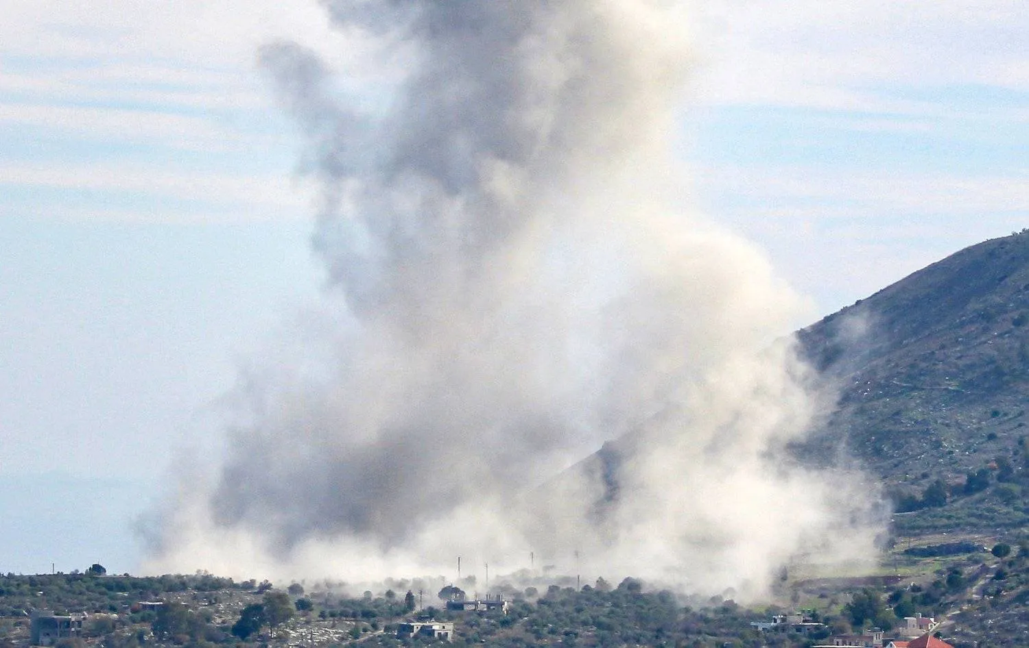 A picture taken from the outskirts of south Lebanon's village of Aitaroun shows smoke billowing after a raid carried out by Israeli warplanes on December 17, 2023. (Photo by AFP)