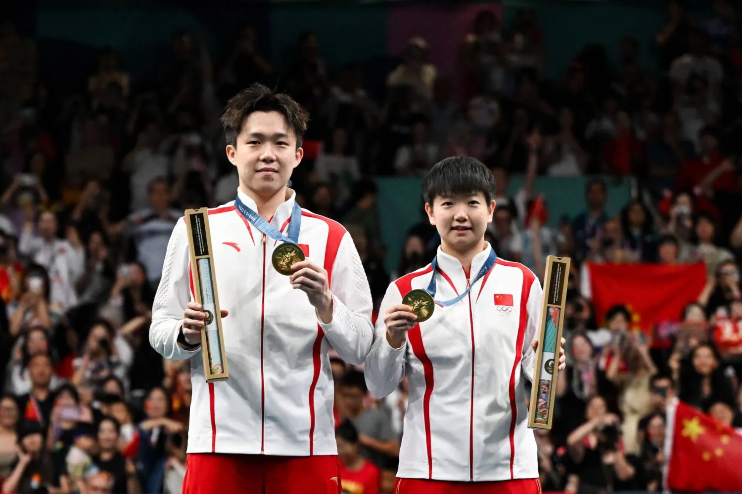 الثنائي الصيني يحرز ذهبية الزوجي المختلط في تنس الطاولة (أ.ف.ب)