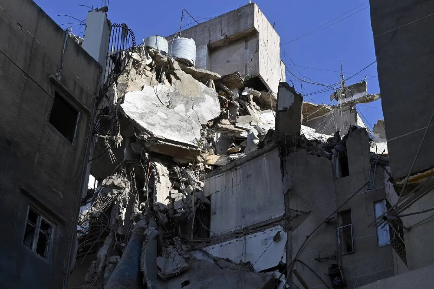 Buildings that were damaged in an Israeli strike the previous day in Beirut, Lebanon, 31 July 2024. (EPA)