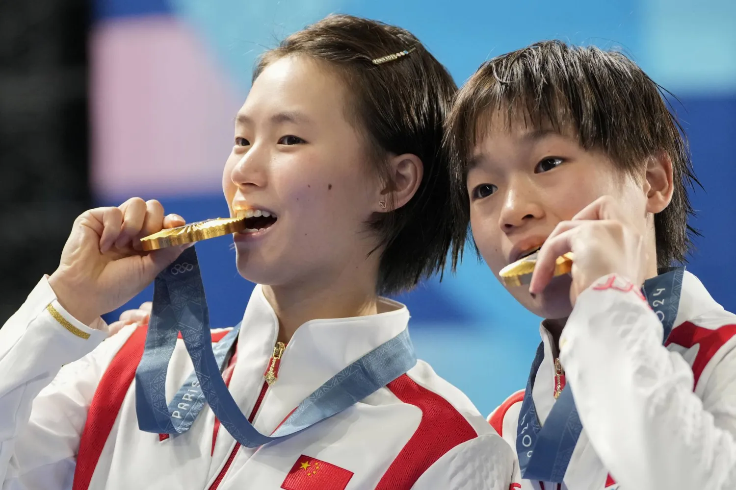 فازت هونغ تشان وتشين يو سي بذهبية الغطس (أ.ب)