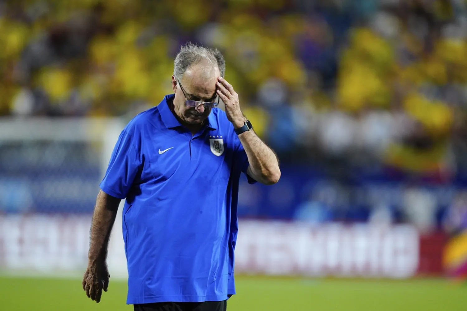 Uruguay's coach Marcelo Bielsa reacts after his team's 1-0 loss against Colombia in a Copa America semifinal soccer match in Charlotte, N.C., Wednesday, July 10, 2024. (AP) 
