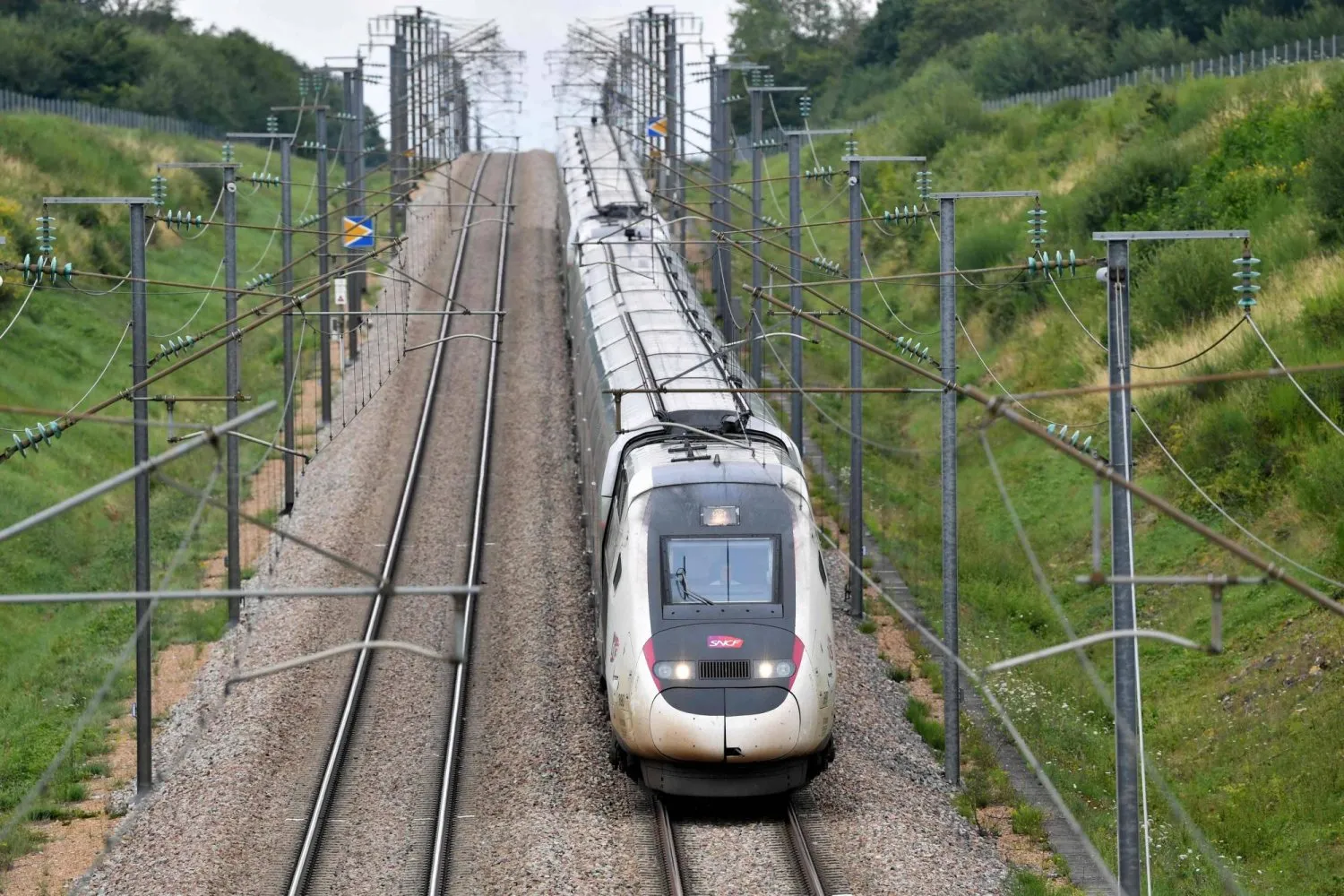 A high-speed train by French railway company SNCF travels on the Bordeaux-Paris route at reduced speed, at Chartres, northern France on July 26, 2024. AFP