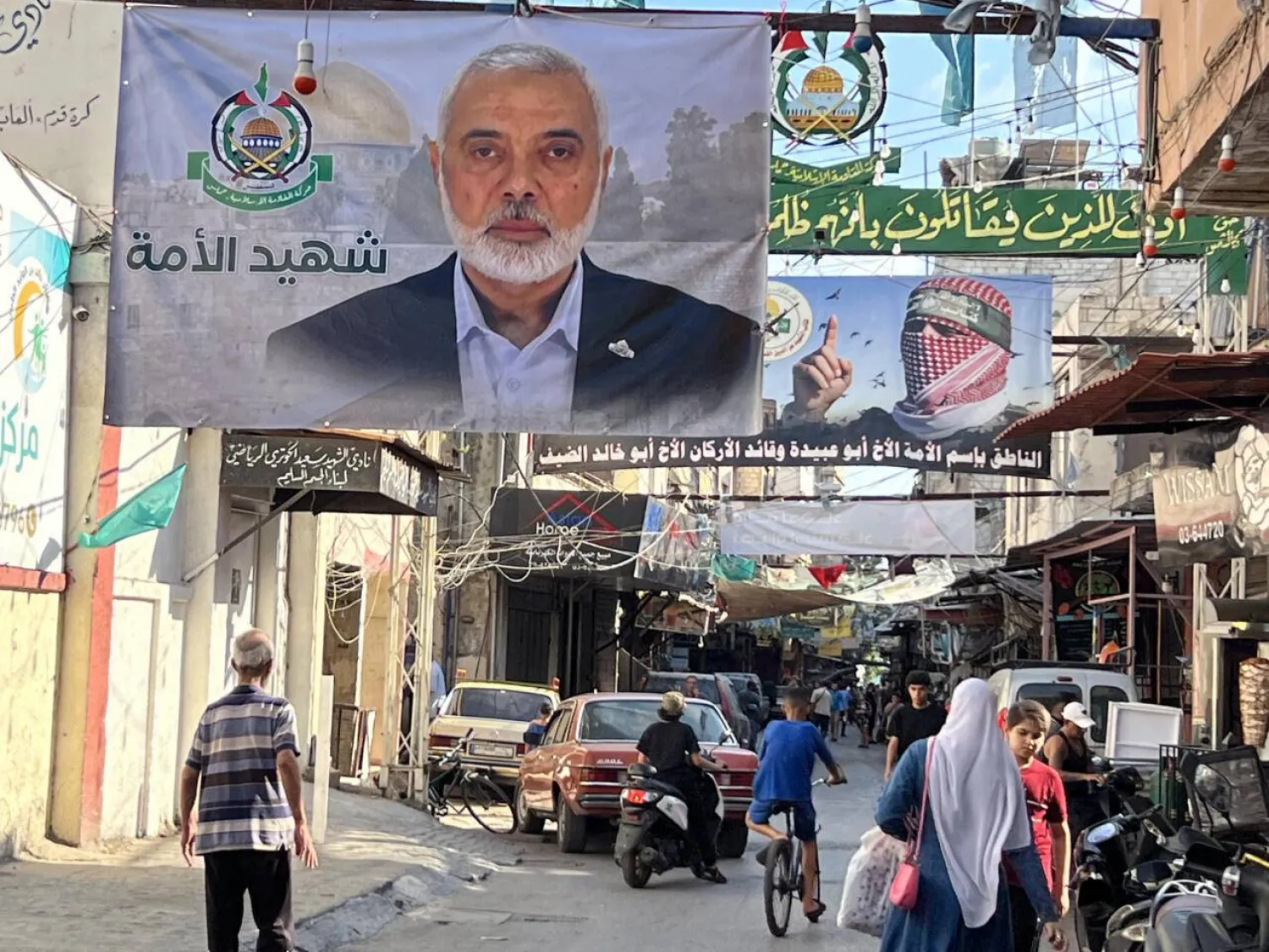 A banner bearing the picture of slain Hamas leader Ismail Haniyeh in the Palestinian refugee camp of Ain al-Hilweh in Lebanon. Mahmoud ZAYYAT / AFP

