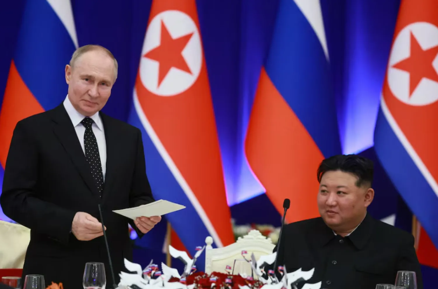 ]Russia's President Vladimir Putin and North Korea's leader Kim Jong Un attend a state reception in Pyongyang, North Korea June 19, 2024. Sputnik/Vladimir Smirnov/Pool via REUTERS/File Photo Purchase Licensing Rights