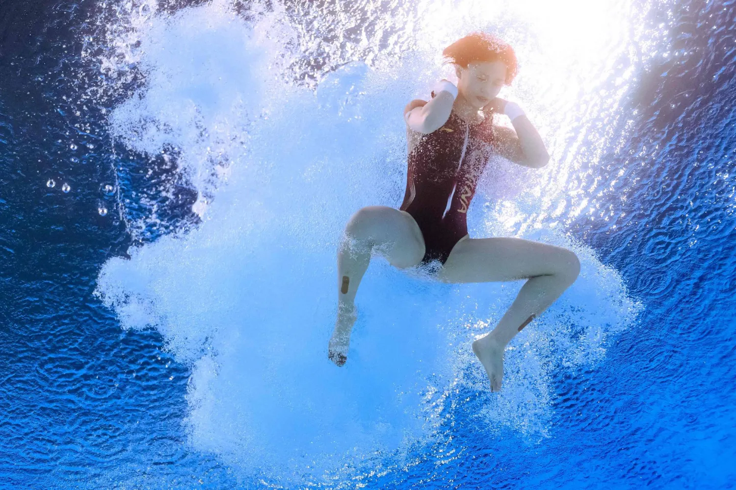 متسابقة الغطس الصينية كوان هونغ تشان تتألق في أولمبياد باريس (أ.ف.ب)