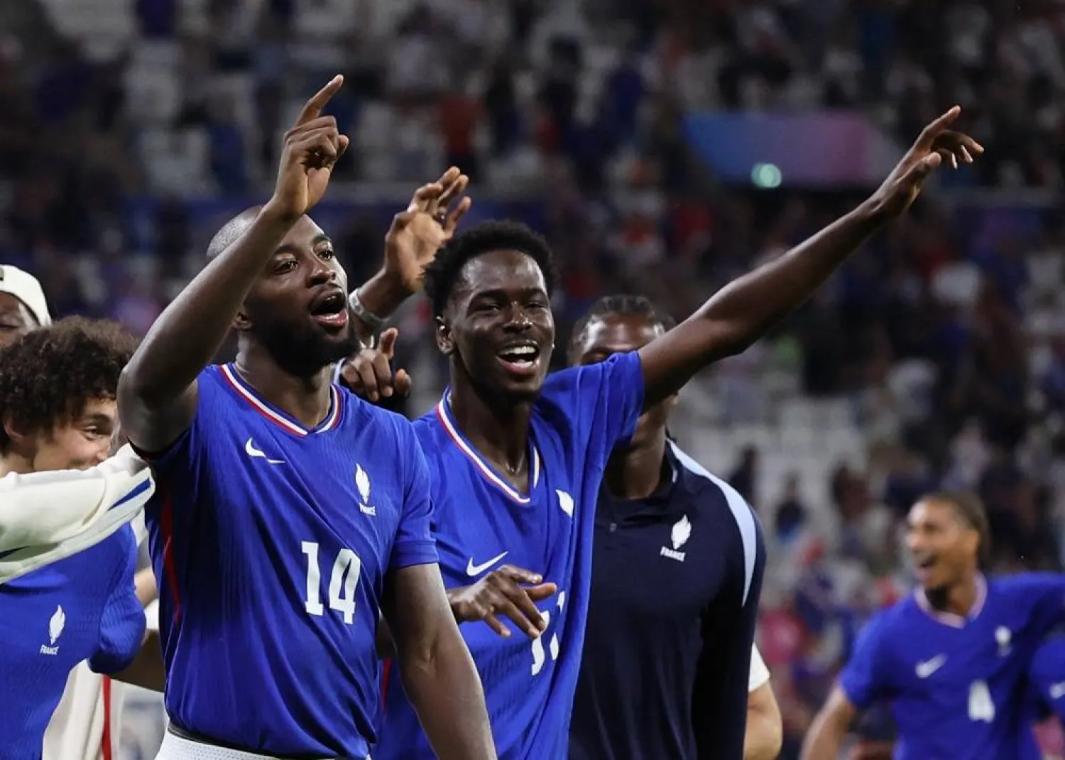  Paris 2024 Olympics - Football - Men's Semi-final - France vs Egypt - Lyon Stadium, Decines-Charpieu, France - August 05, 2024. Jean-Philippe Mateta of France celebrates with teammates after the match. (Reuters)