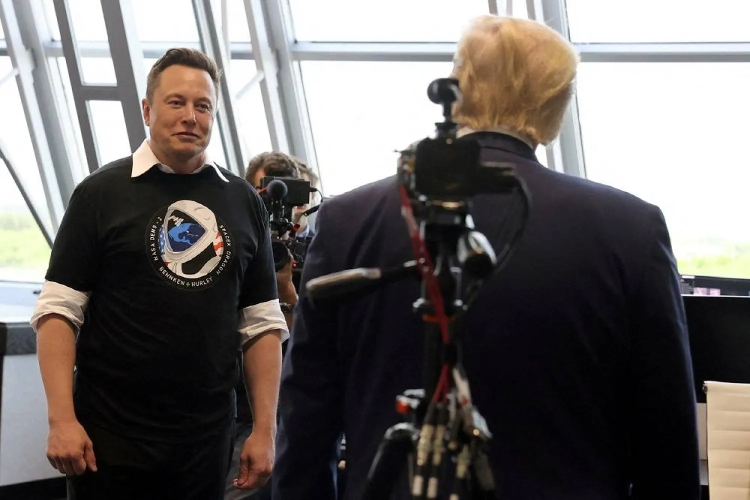 US President Donald Trump and Elon Musk are seen at the Firing Room Four after the launch of a SpaceX Falcon 9 rocket and Crew Dragon spacecraft on NASA's SpaceX Demo-2 mission to the International Space Station from NASA's Kennedy Space Center in Cape Canaveral, Florida, US, May 30, 2020. (Reuters)