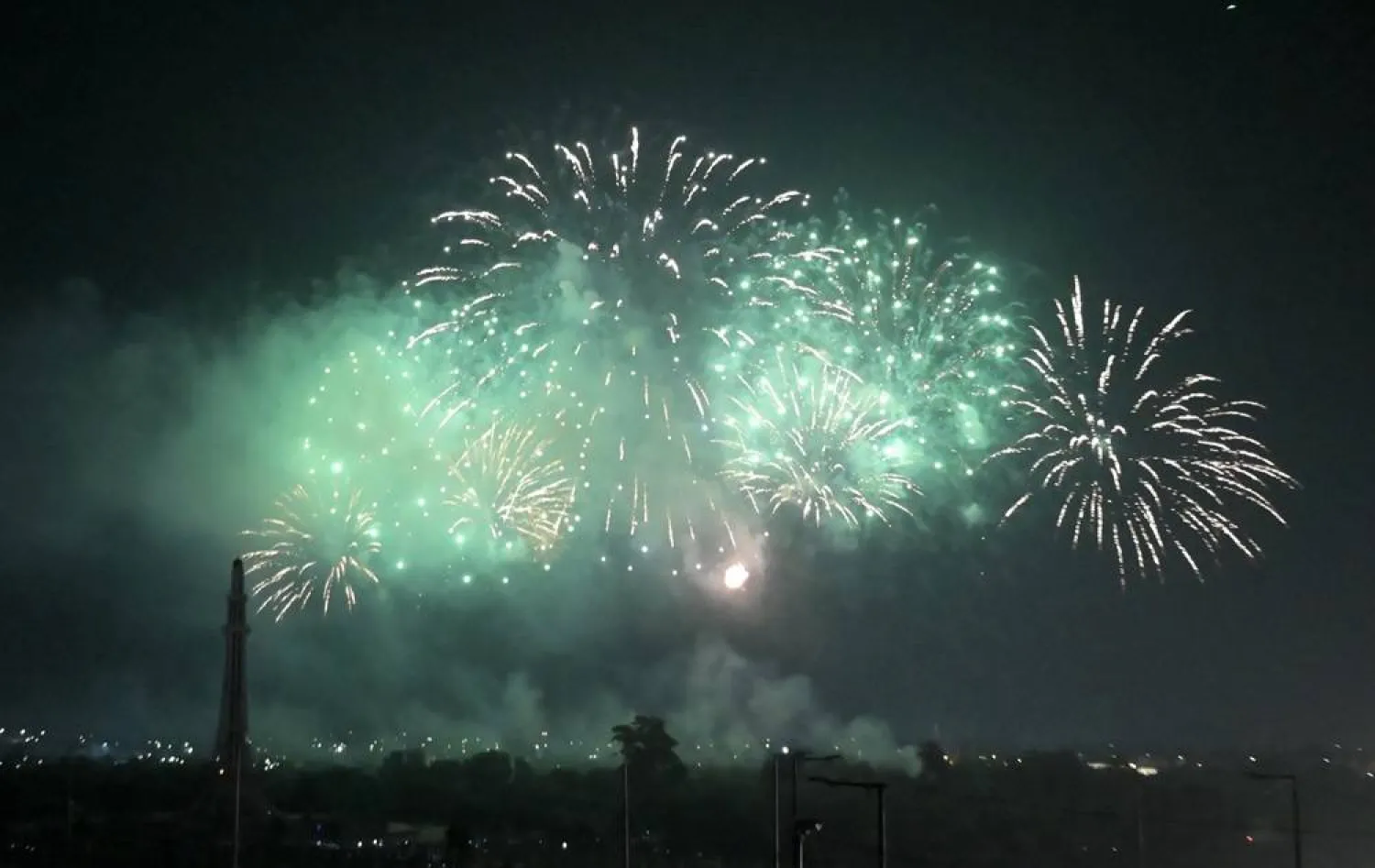 Fireworks explode during the celebrations marking the 77th anniversary of Pakistan's Independence, in Lahore, Pakistan, 14 August 2024. (EPA)