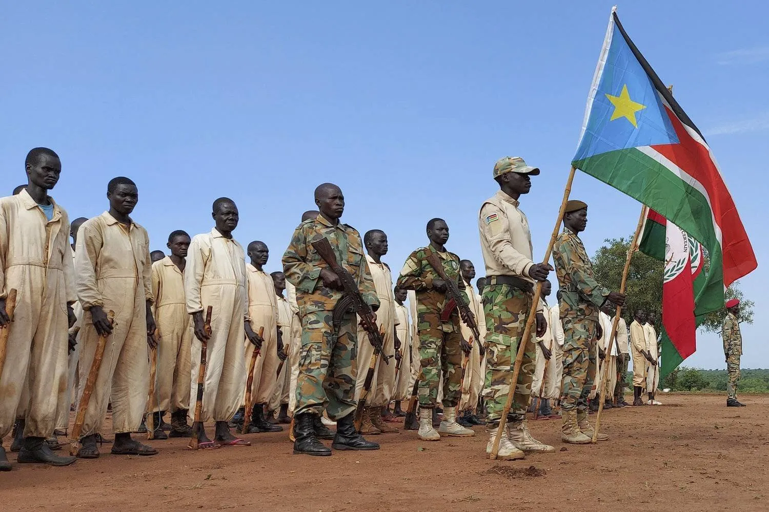 File photo: Military trainees parade during the visit of the defense minister to a military training center in Owiny Ki-Bul, Eastern Equatoria, South Sudan on June 27, 2020. (AP Photo/Maura Ajak, File) (ASSOCIATED PRESS)