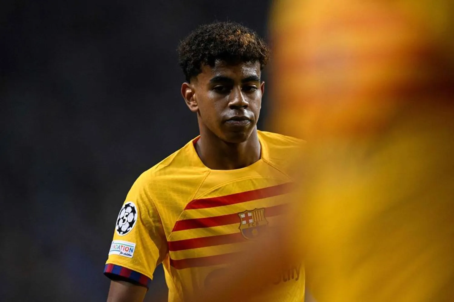 Barcelona's Spanish forward #27 Lamine Yamal looks on during the UEFA Champions League 1st round day 2 group H football match between FC Porto and FC Barcelona at the Dragao stadium in Porto on October 4, 2023. (AFP)