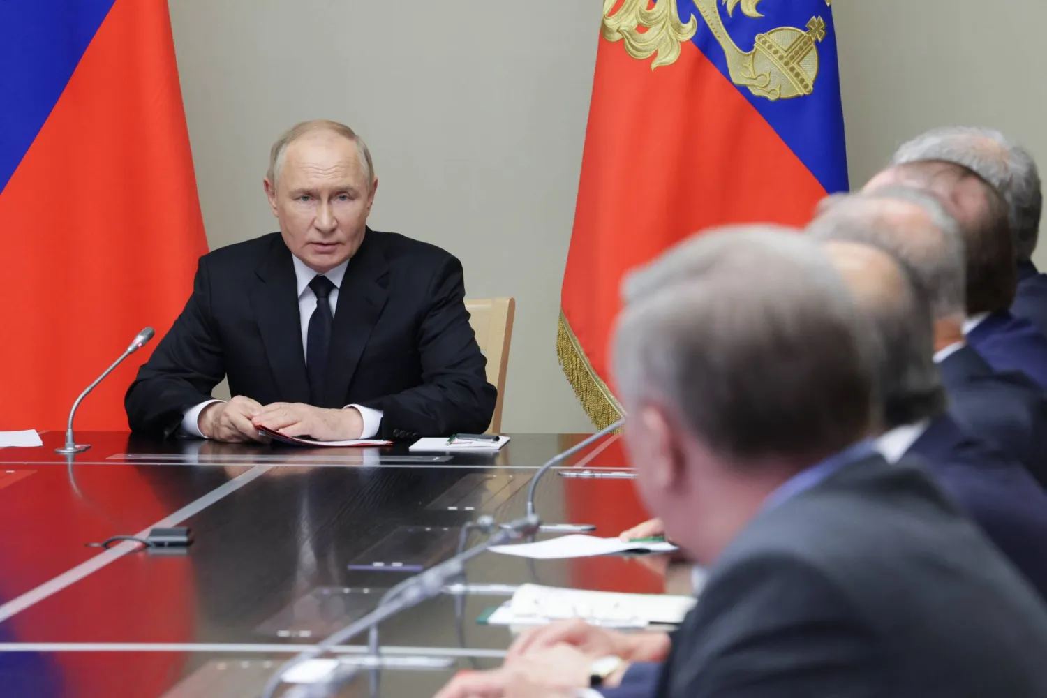 Russian President Vladimir Putin (L) chairs a meeting with members of the Security Council at the Novo-Ogaryovo state residence, outside Moscow, Russia, 16 August 2024.   EPA/ALEKSEY BABUSHKIN/SPUTNIK/KREMLIN