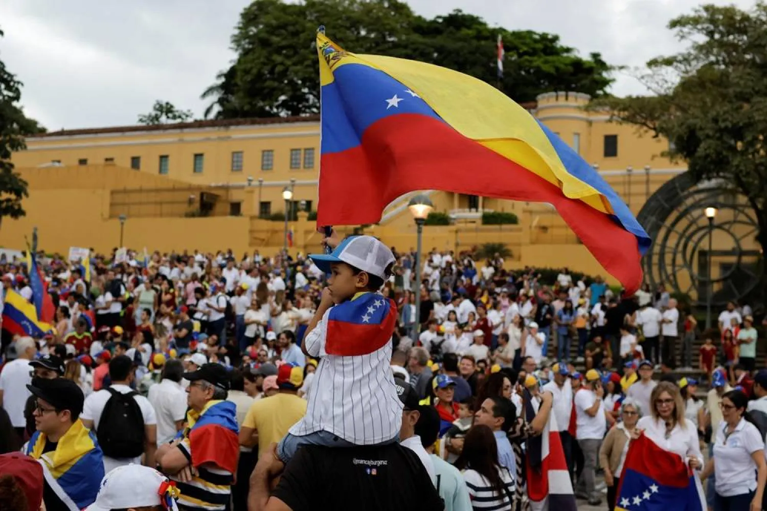  A child holds a Venezuelan flag as Venezuelan opposition supporters participate in a global protest amid Venezuela's disputed presidential election, in San Jose, Costa Rica, August 17, 2024. (Reuters)