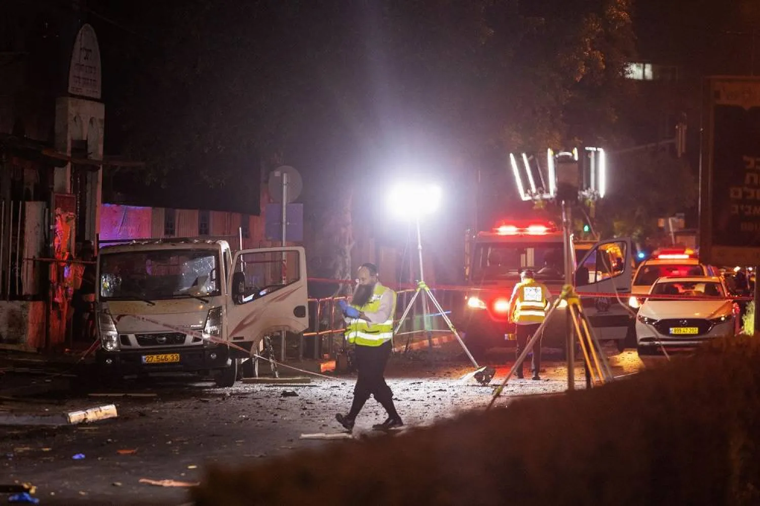 Israeli security and emergency responders work at the site of a bomb blast in Tel Aviv, Israel August 18, 2024. (Reuters)