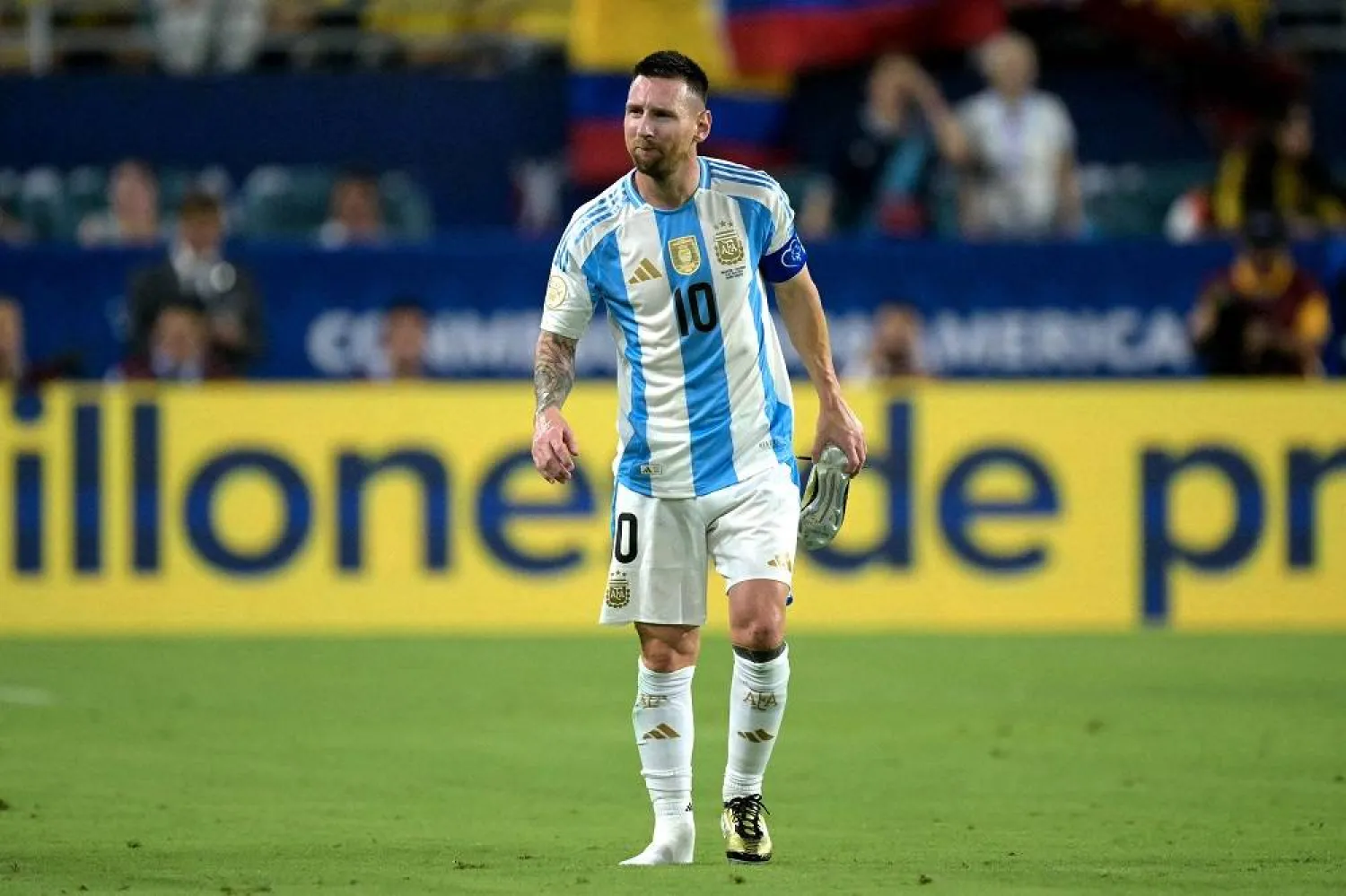 Argentina's forward #10 Lionel Messi leaves the pitch after picking up an injury during the Conmebol 2024 Copa America tournament final football match between Argentina and Colombia at the Hard Rock Stadium, in Miami, Florida on July 14, 2024. (AFP)