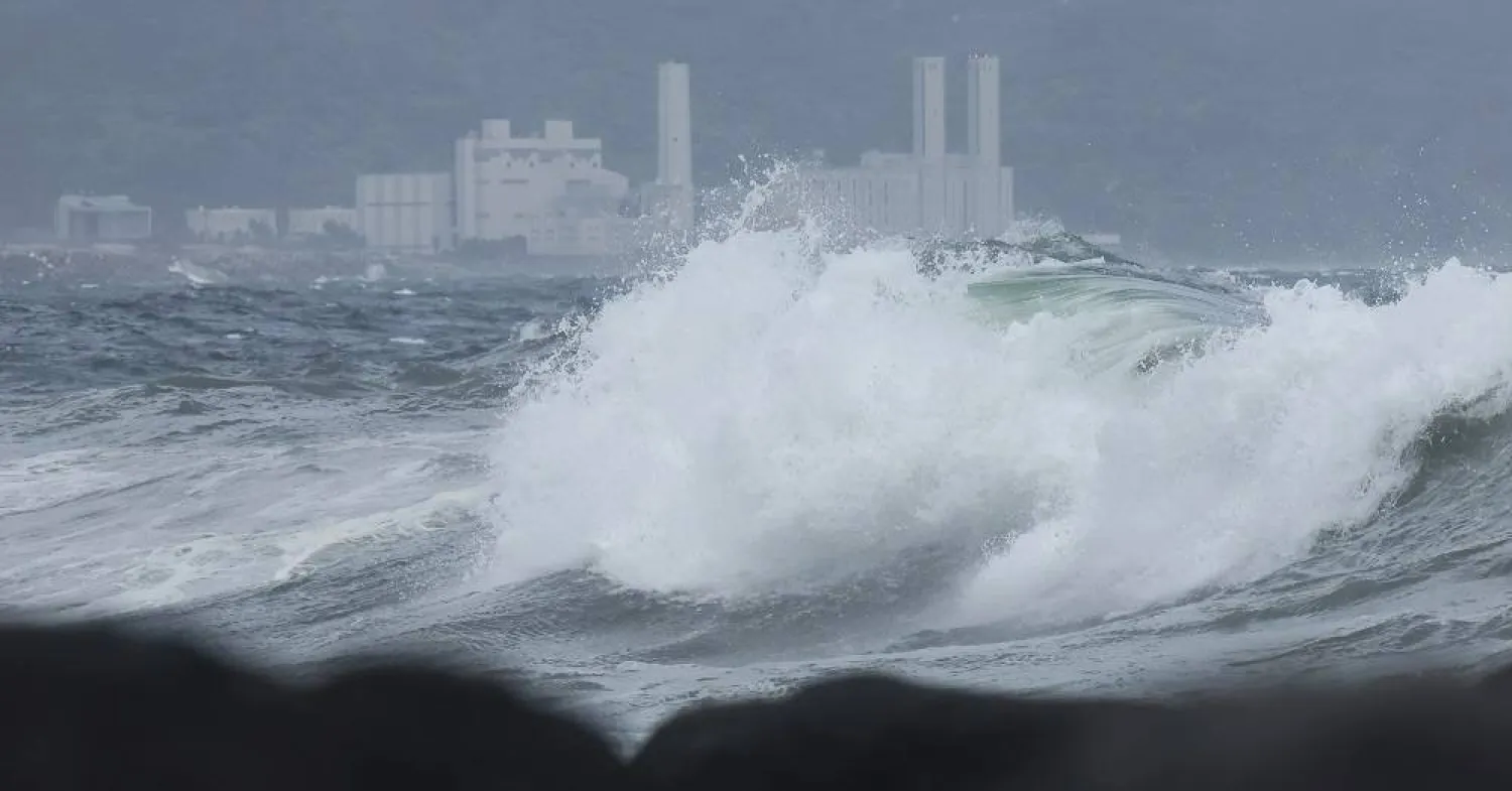 High waves crash ashore as tropical storm Jongdari approaches Jeju Island, South Korea, Tuesday, Aug. 20, 2024. (Park Ji-ho/Yonhap via AP)