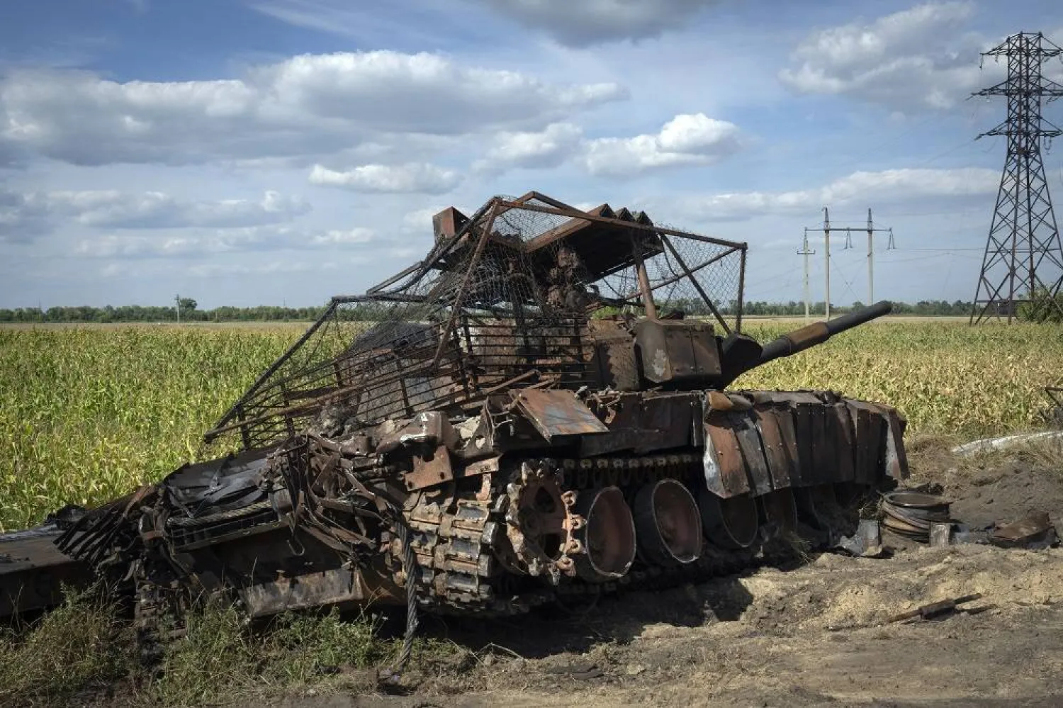 A destroyed Russian tank sits on a roadside near the town of Sudzha, Russia, in the Kursk region, on Aug. 16, 2024. (AP Photo, File)