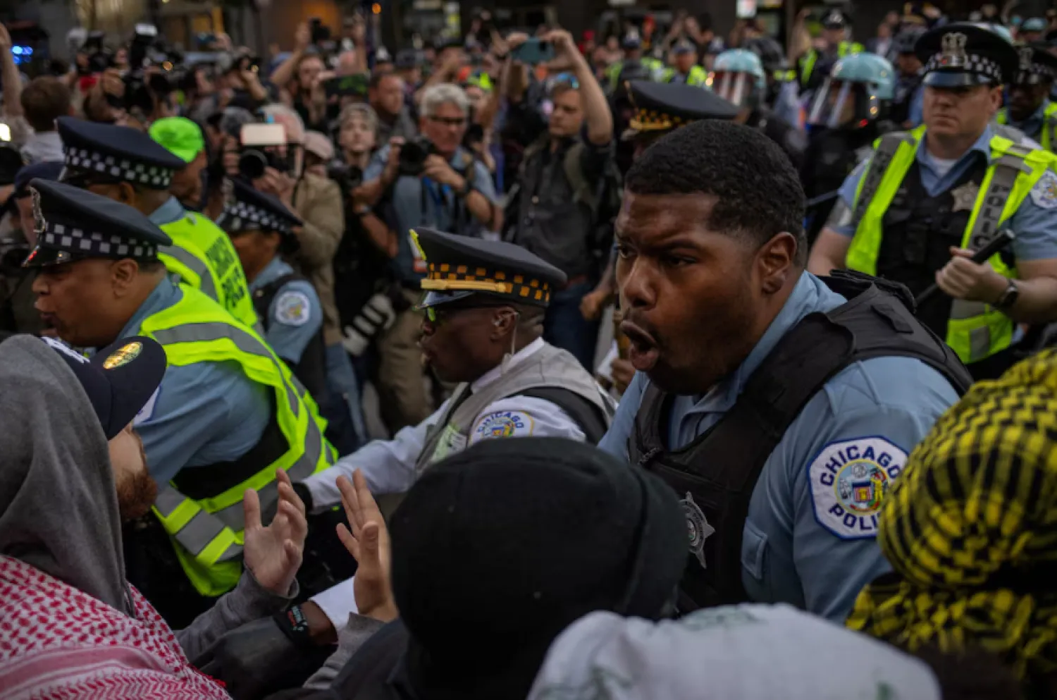 Thousands of mostly peaceful pro-Palestinian protesters have marched and demonstrated outside the Democratic National Convention, in a show of anger against the Biden administration's support for Israel in the Gaza war. ( Reuters Photo)