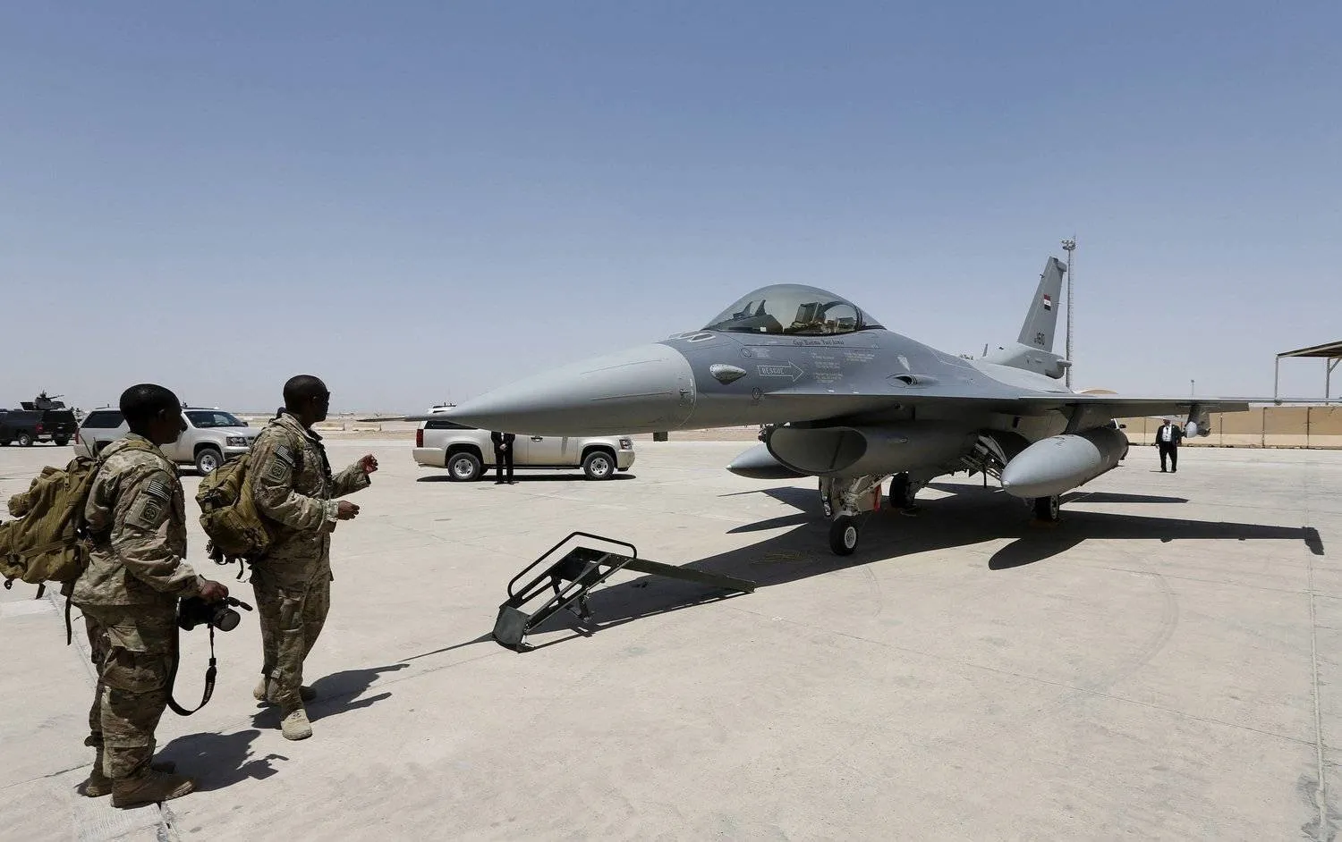 US soldiers during a ceremony handing over four F-16 fighter jets at Balad Air Base. (AP) 
