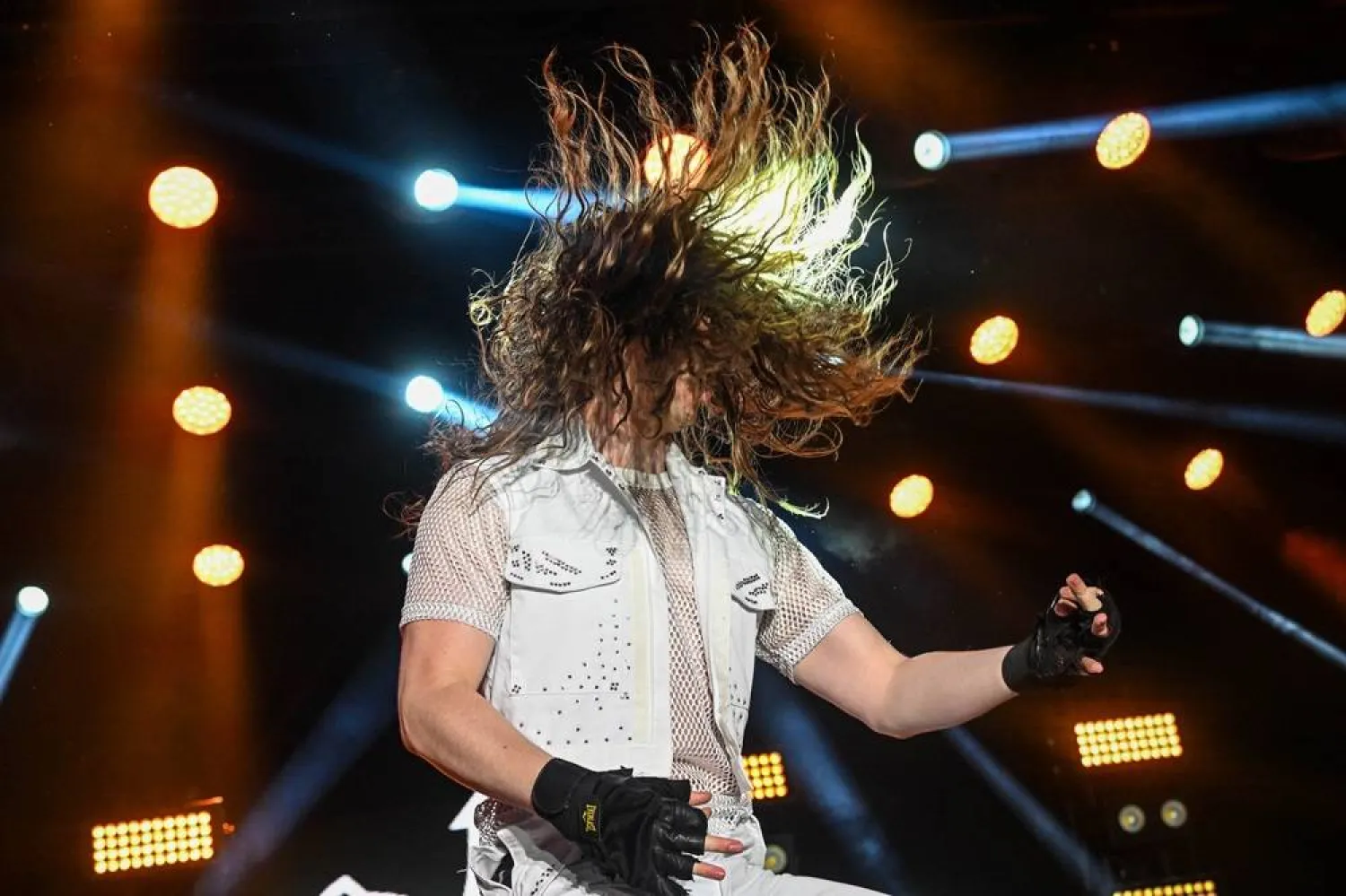 Zach "Ichabod Fame" Knowles from Canada performs during the first round in the final of the Air Guitar World Championship in Oulu, Finland, 23 August 2024. (EPA) 