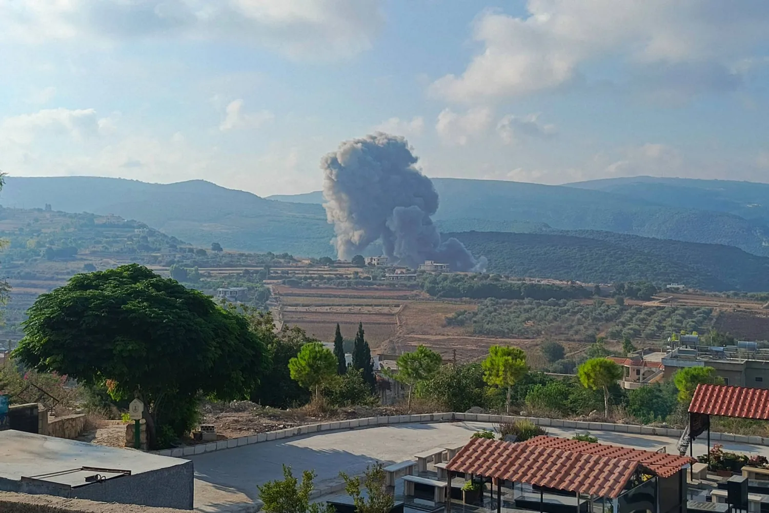 Smoke billows from the site of an Israeli airstrike on Zibqin in southern Lebanon on August 25, 2024, amid escalations in the ongoing cross-border tensions.  (Photo by Kawnat HAJU / AFP)