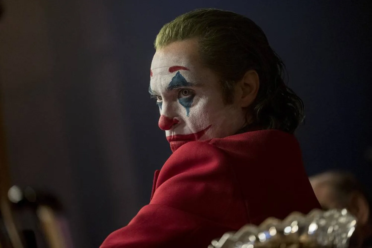 This image released by Warner Bros. Pictures shows Joaquin Phoenix in a scene from "Joker." (Niko Tavernise/Warner Bros. Pictures via AP)
