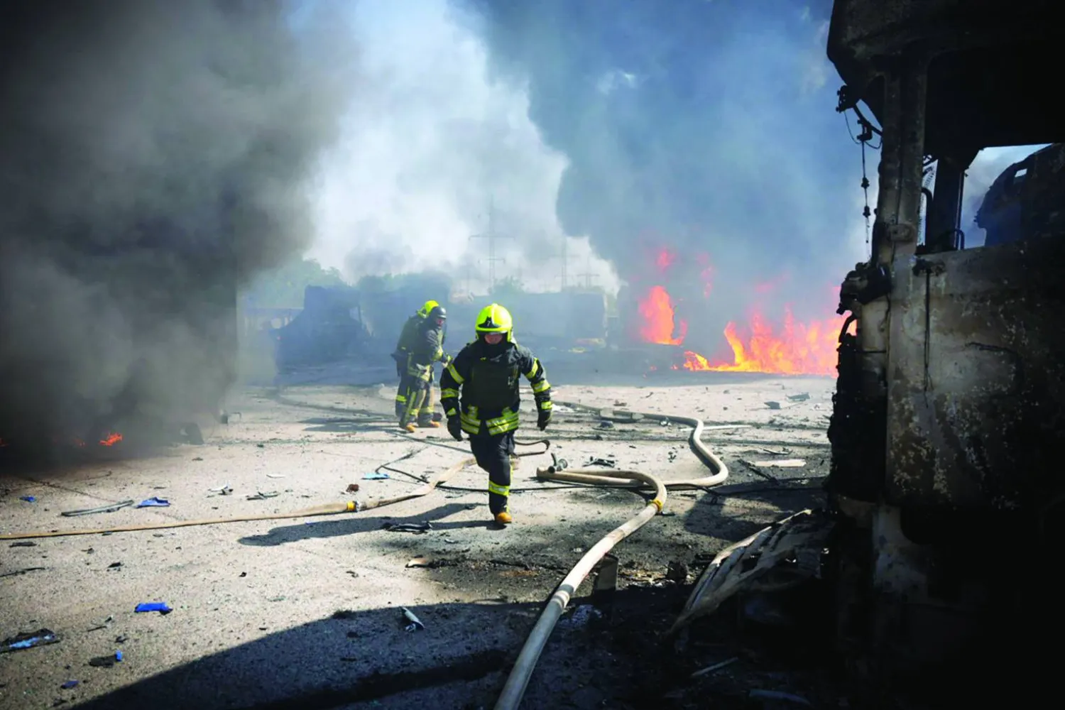 This handout photograph taken and released by the Ukrainian Emergency Service on August 26, 2024 shows rescuers working to extinguish a fire following a missile attack at an undisclosed location in Odesa region of Ukraine. (Photo by Handout / UKRAINIAN EMERGENCY SERVICE / AFP)  