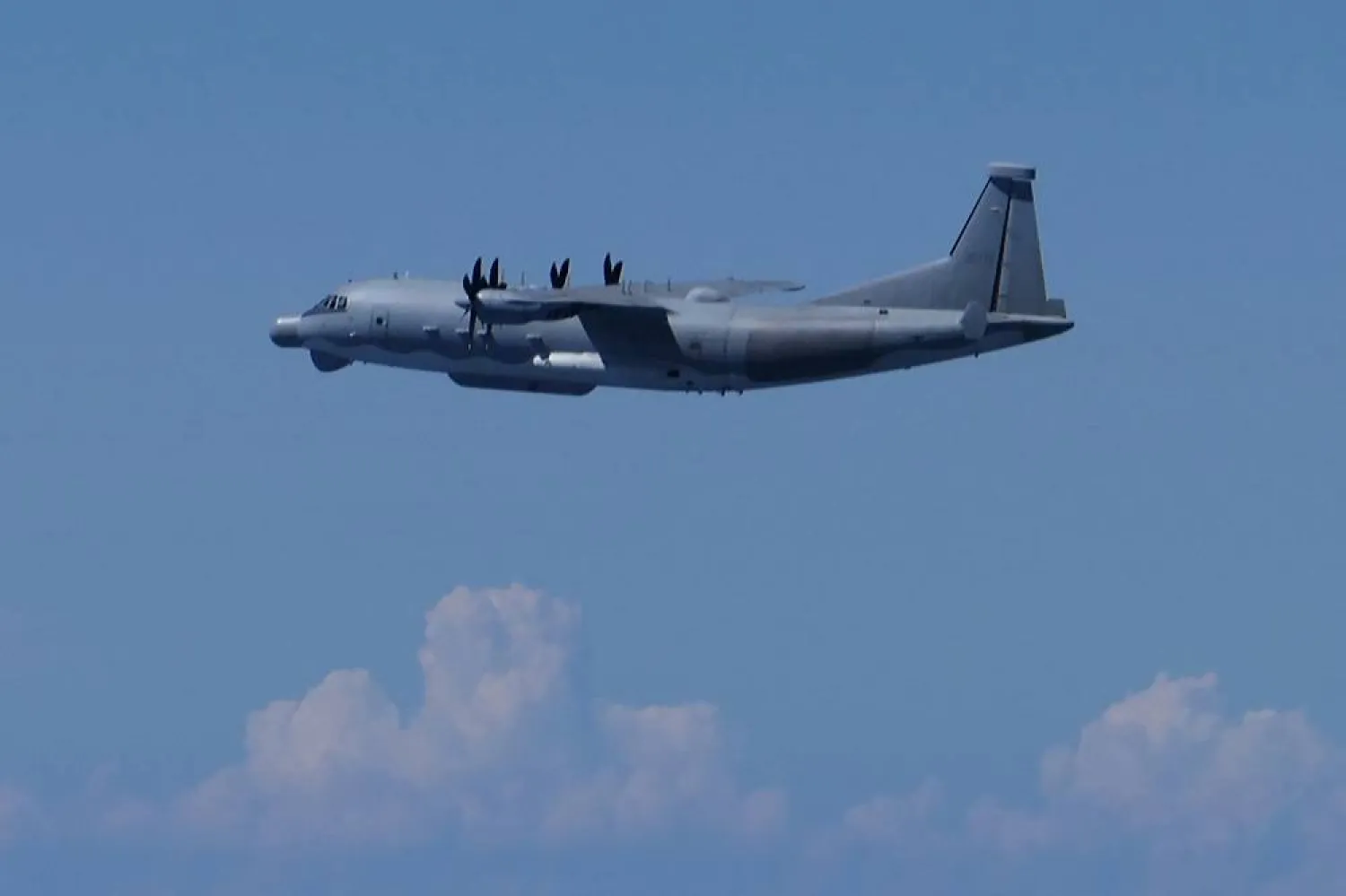 This handout photo taken and released on August 26, 2024 by Japan's Ministry of Defense Joint Staff Office shows a Chinese military Y9 intelligence-gathering aircraft that Japan's defense ministry said "violated" Japanese airspace. (Handout / Japan's Ministry of Defense / AFP) 