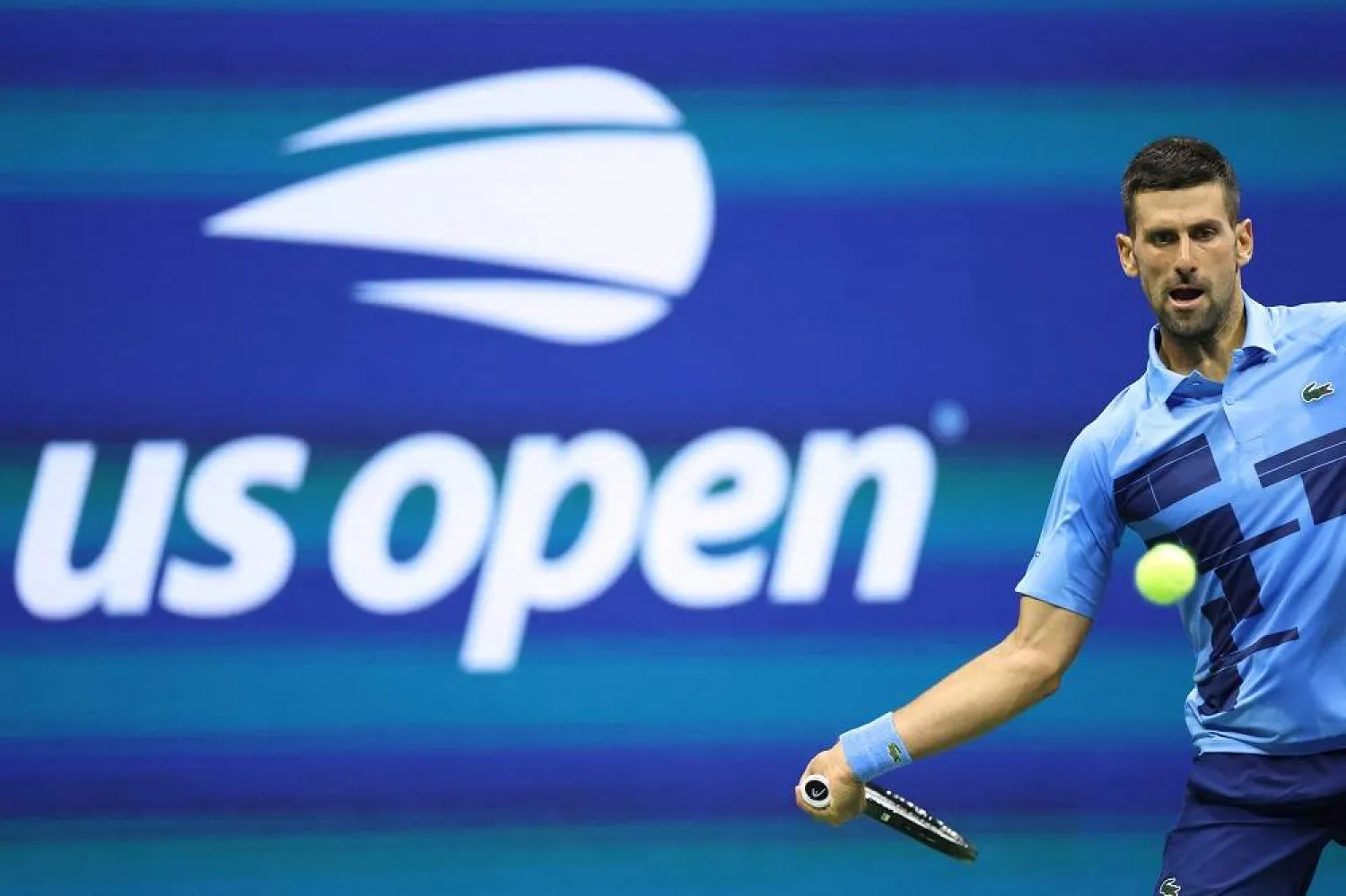  Serbia's Novak Djokovic returns the ball to Moldova's Radu Albot during their men's singles first round tennis match on day one of the US Open tennis tournament at the USTA Billie Jean King National Tennis Center in New York City, on August 26, 2024. (AFP)