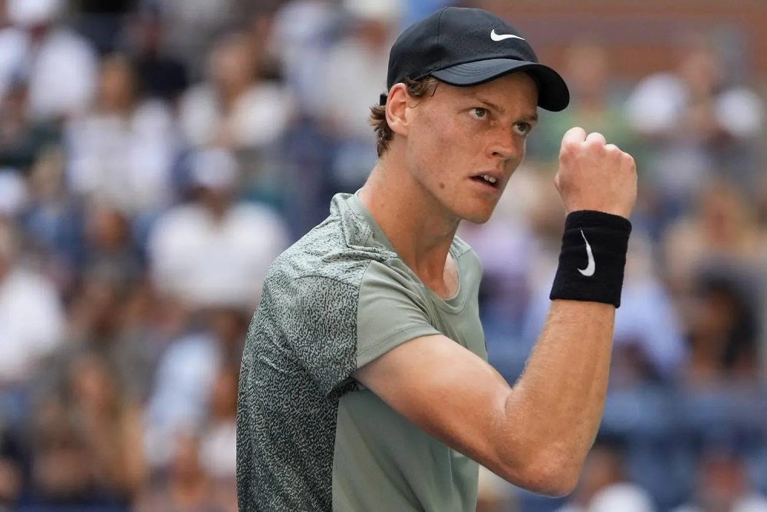 Jannik Sinner, of Italy, reacts after scoring a point against Mackenzie McDonald, of the United States, during the first round of the US Open tennis championships, Tuesday, Aug. 27, 2024, in New York. (AP)