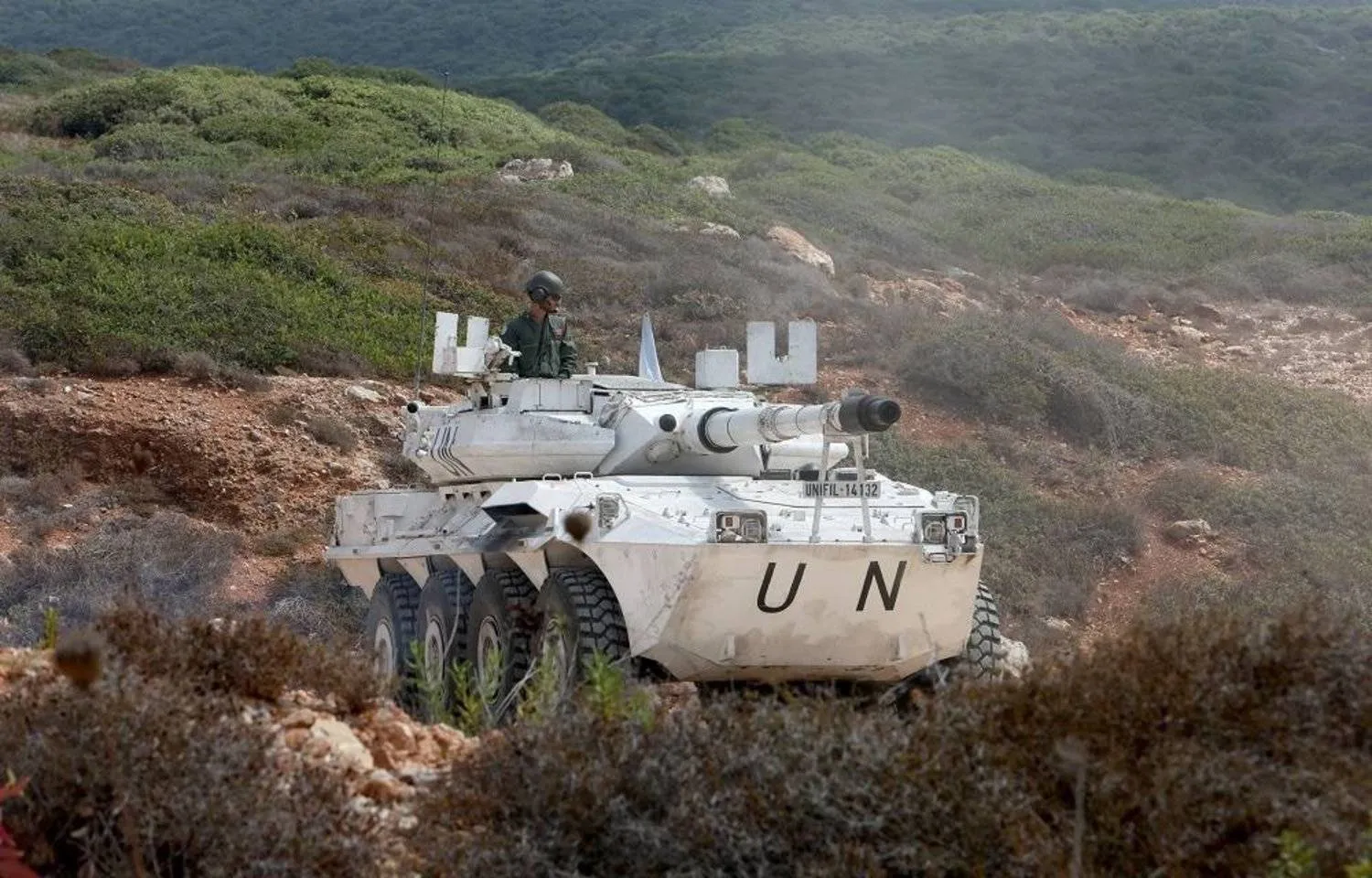 A United Nations peacekeeper (UNIFIL) is pictured on a UN armored vehicle in Naqoura, near the border with Israel, southern Lebanon, August 31, 2023. (Reuters)